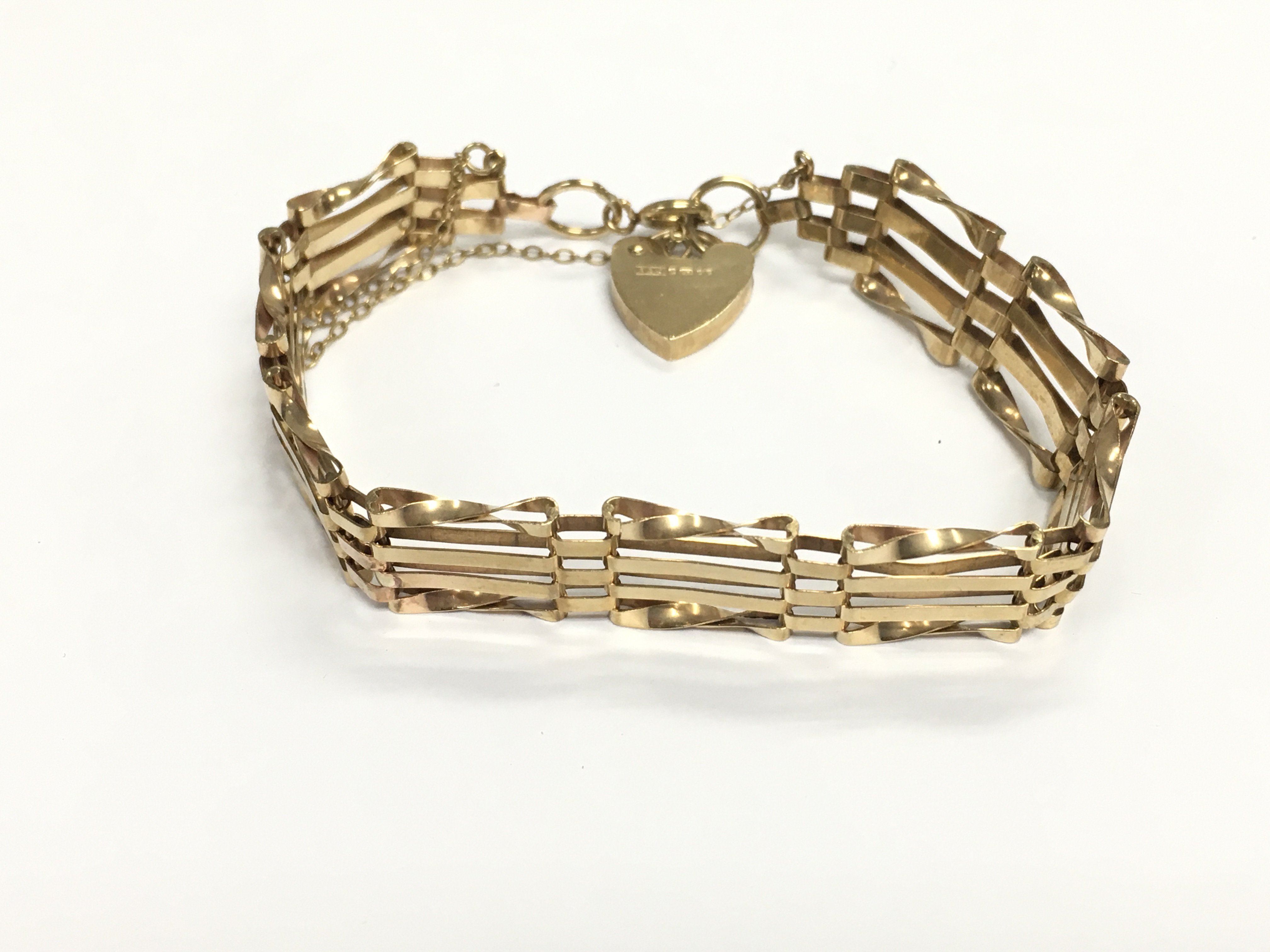 A 9ct gold gate bracelet. 10.54g