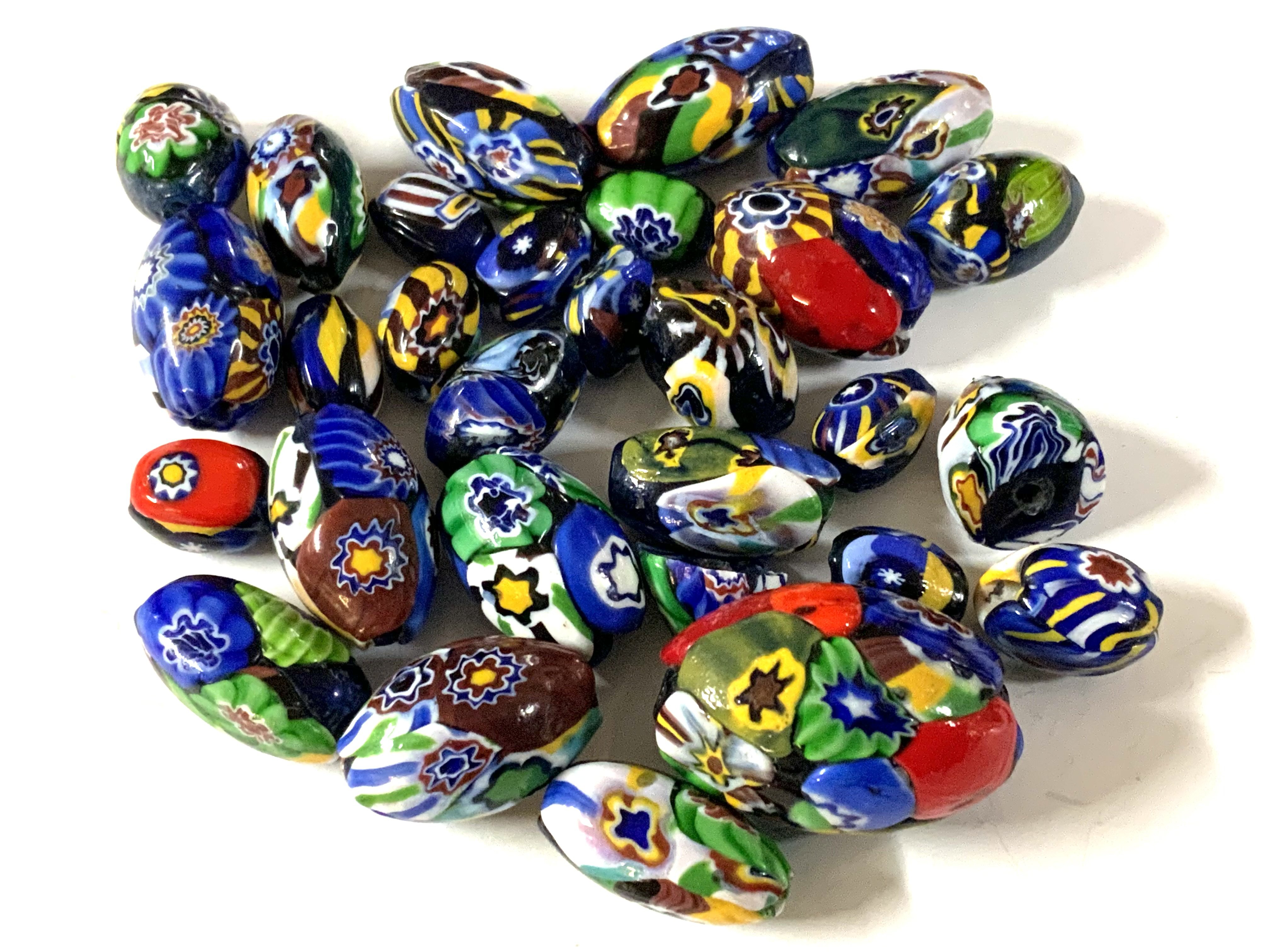 A group of Venetian glass beads. (A)