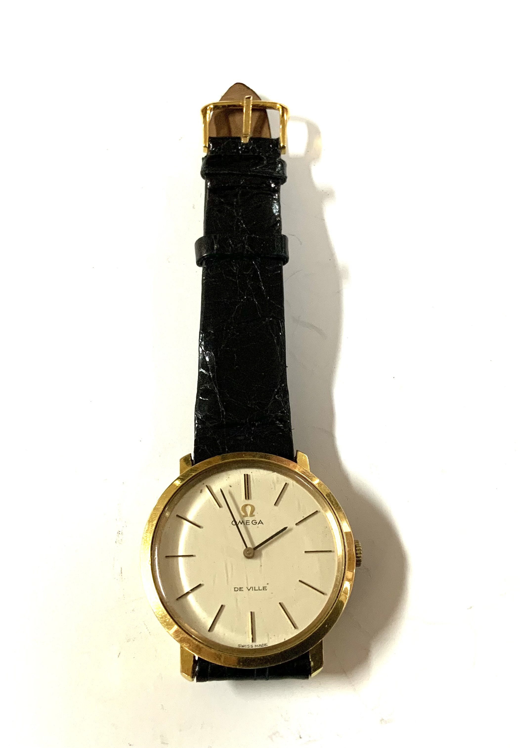 A vintage gold plated Omega wristwatch. seen working