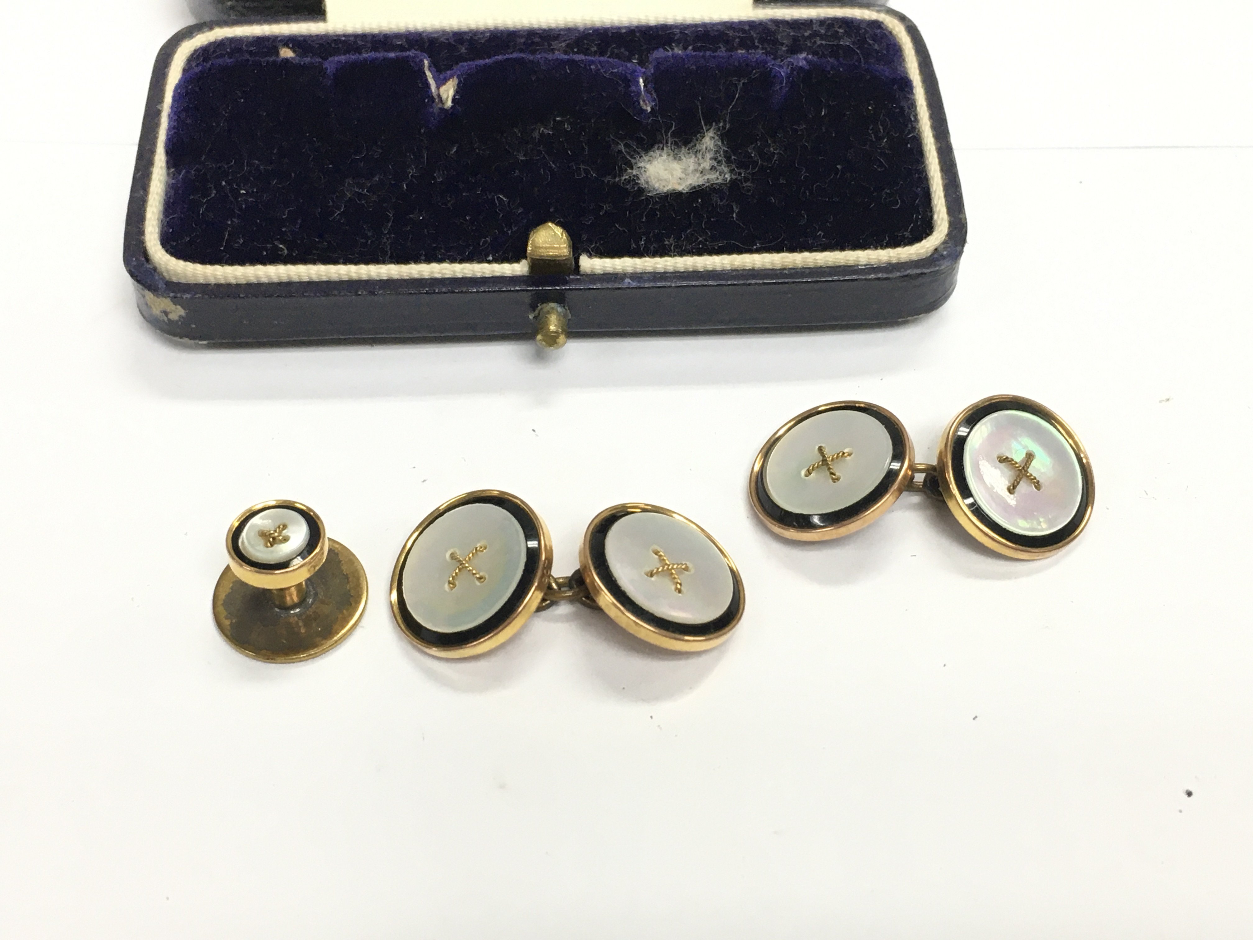 WITHDRAWN A set of gents 9ct gold studs. 6.13g