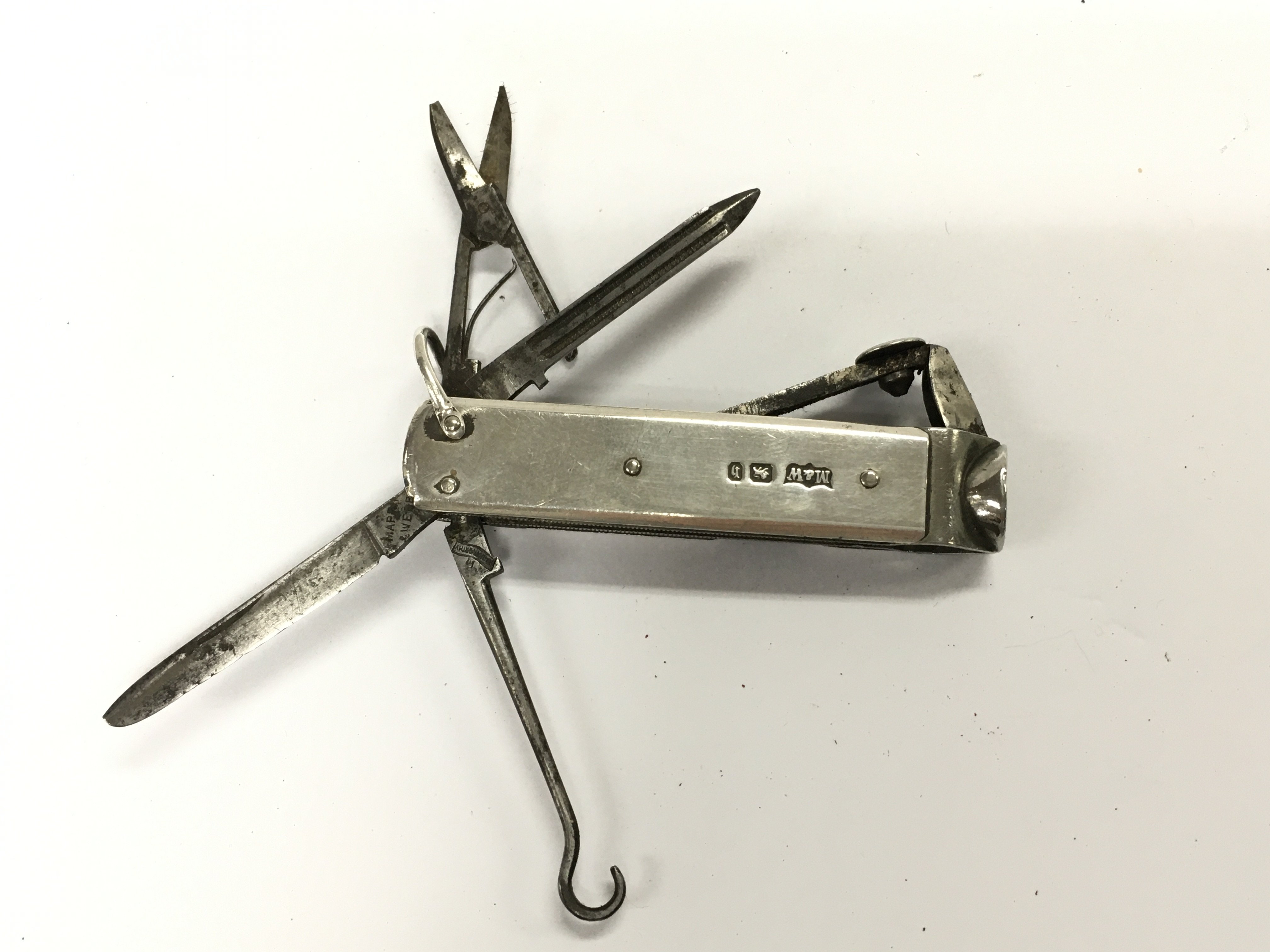 A silver Mappin and Webb Shibayama multi tool. Postage B