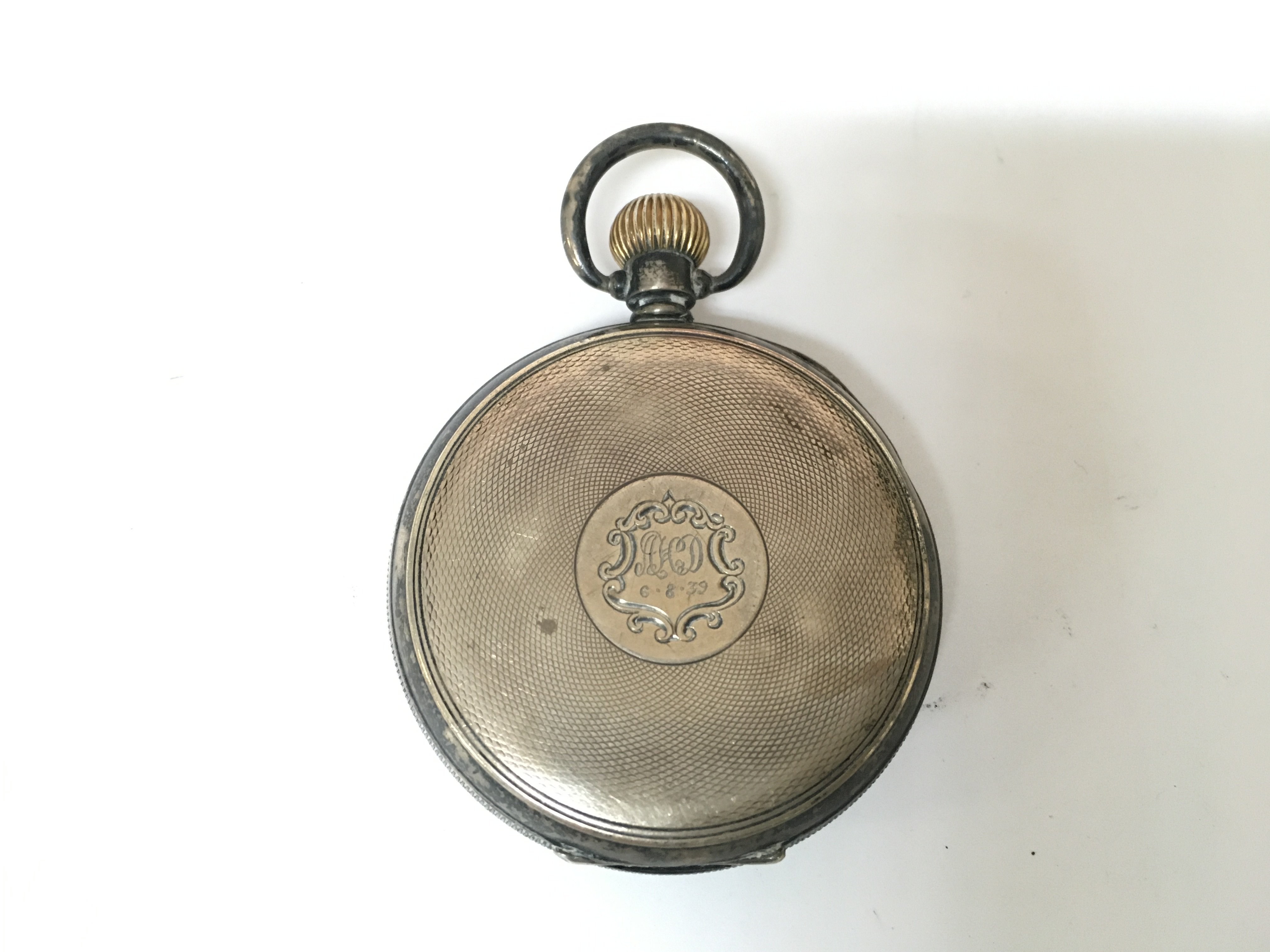 A silver hallmarked Waltham pocket watch. 99g winds and runs.
