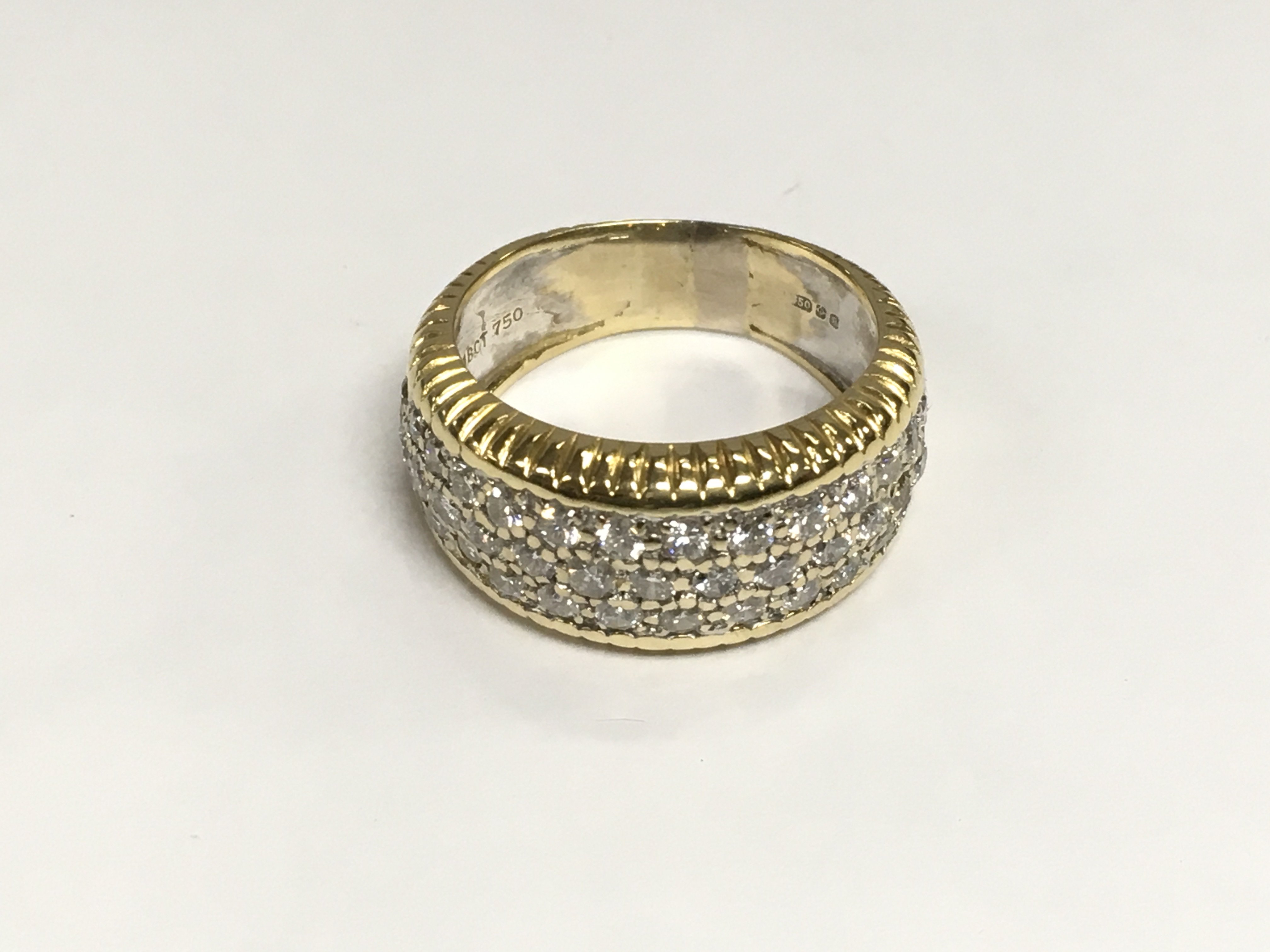 An 18ct gold pave set diamond ring, approx 7.4g and approx size K-L. Shipping category A.