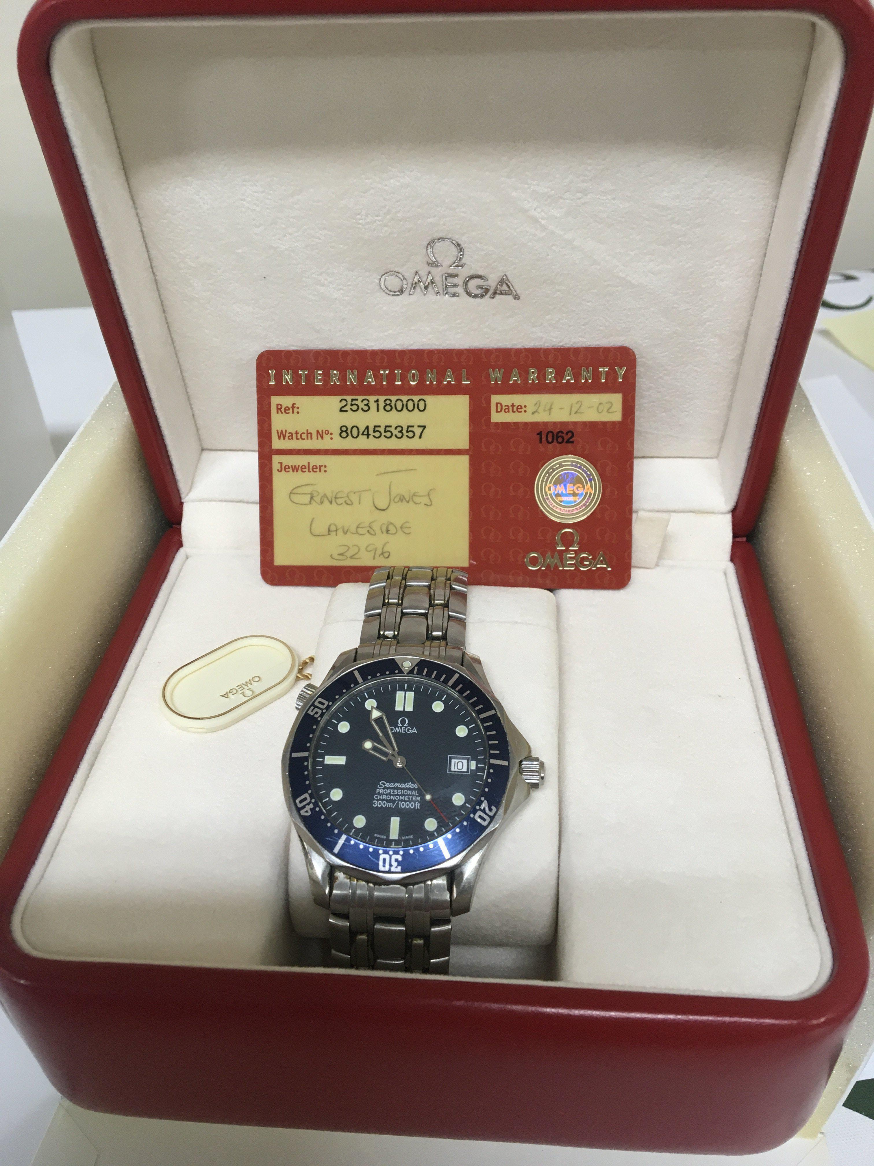 A Gents Omega Seamaster Professional Chronometer Automatic watch blue dial with date aperture illuminated batons fully functional. With box and warranty cards Chronometer card. Operational instruction and hanging tag warranty card with purchase date 24/12/02 Reference 2531800 watch number 80455357. Extra links and outer box.