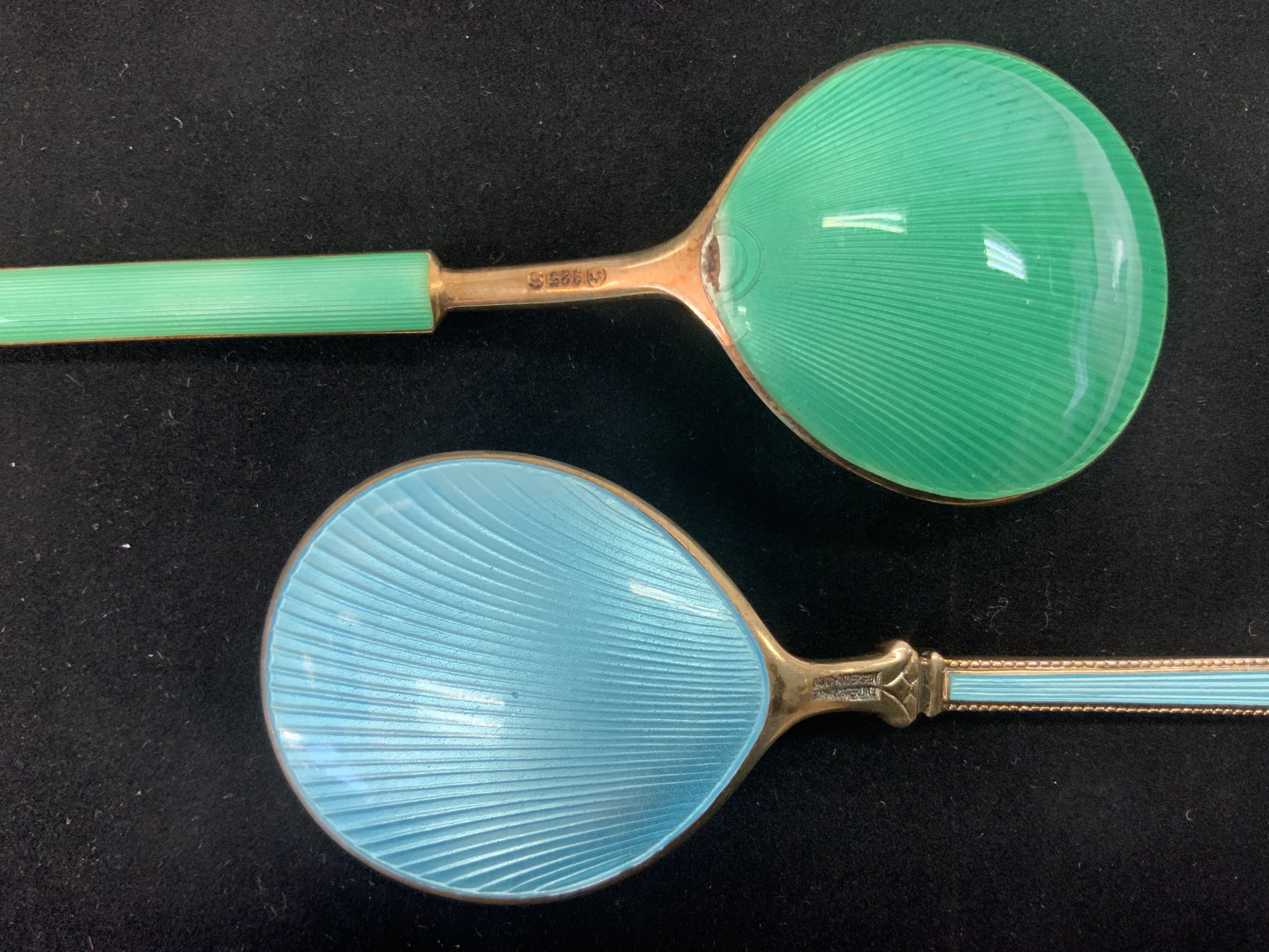 A David Andersen blue guilloche enamelled silver spoon together with a Norwegian guilloche enamel spoon. (A) NO RESERVE