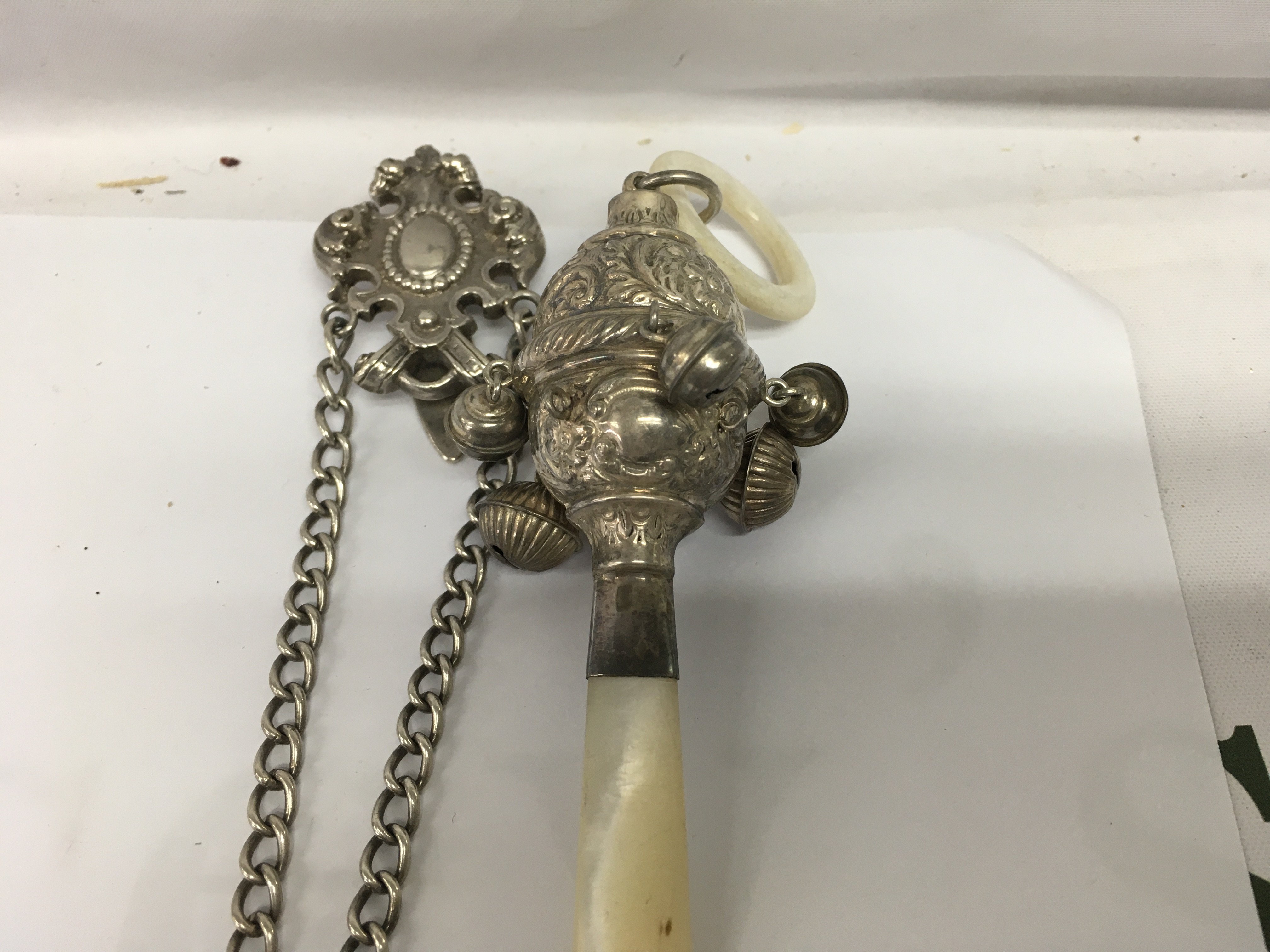 A child&#2013266057_s silver rattle and a Victorian chatelaine. NO RESERVE