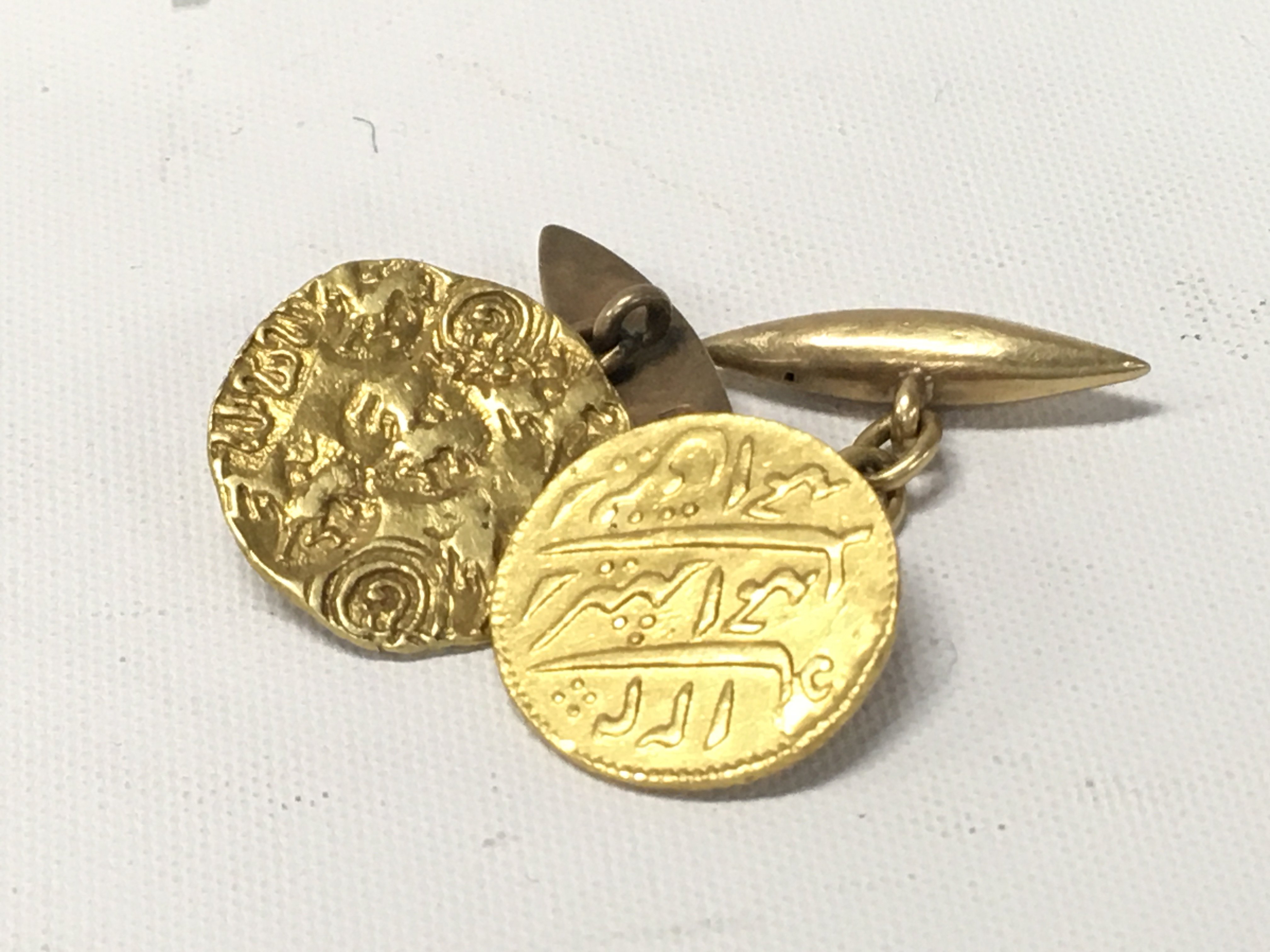 Two coin cufflinks including 1 rupee and another coin. Approx weight 11.08 grams.