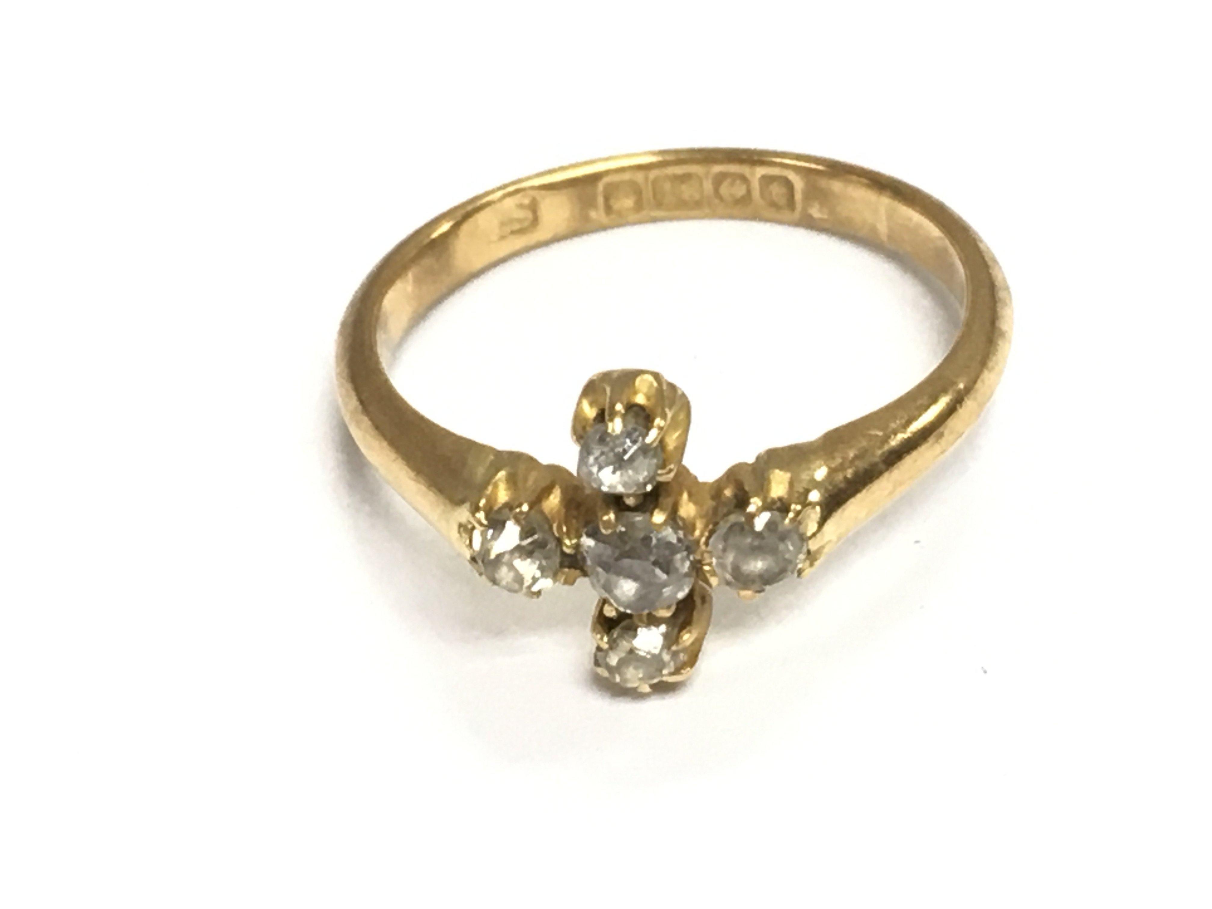 An 18ct gold ring set with diamonds. 3.53 and size N 1/2