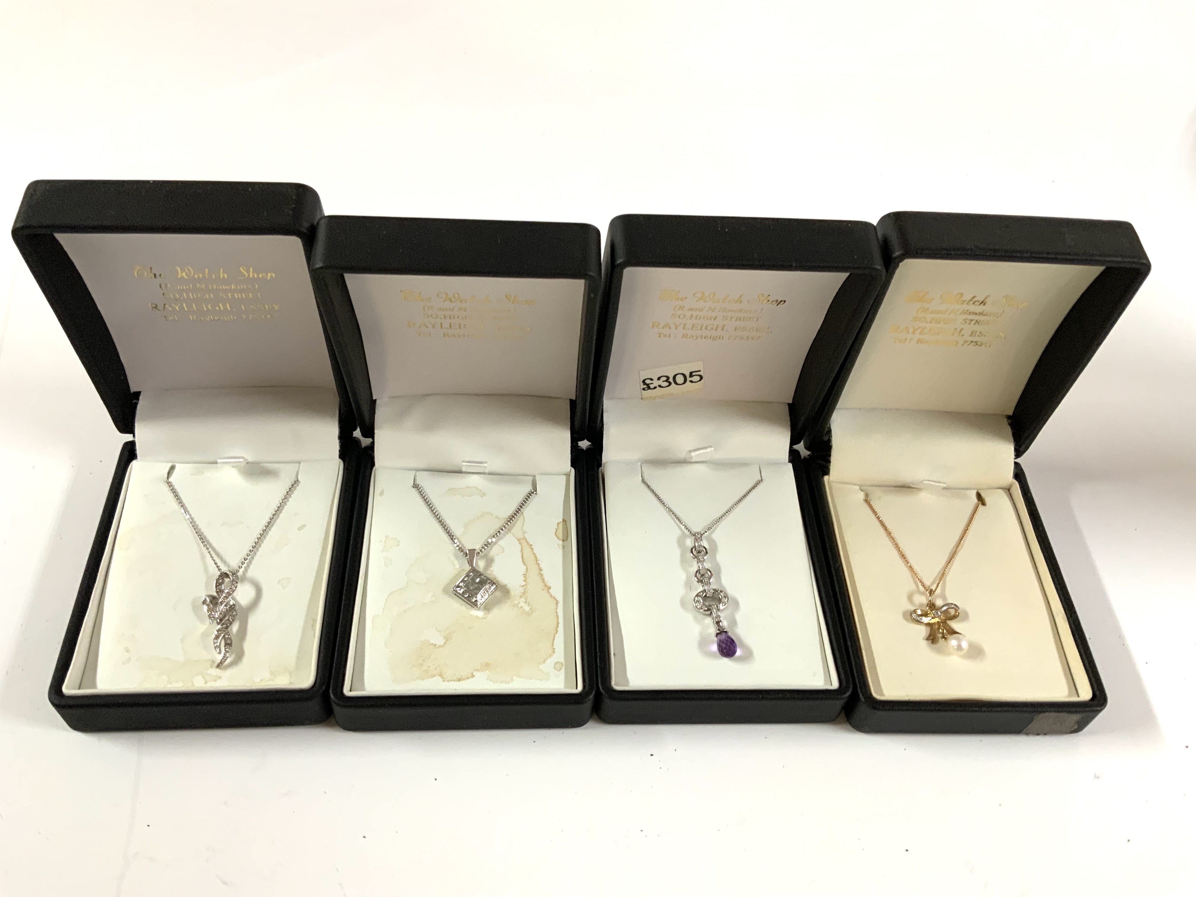 9ct gold stone set pendants and chains. (A)