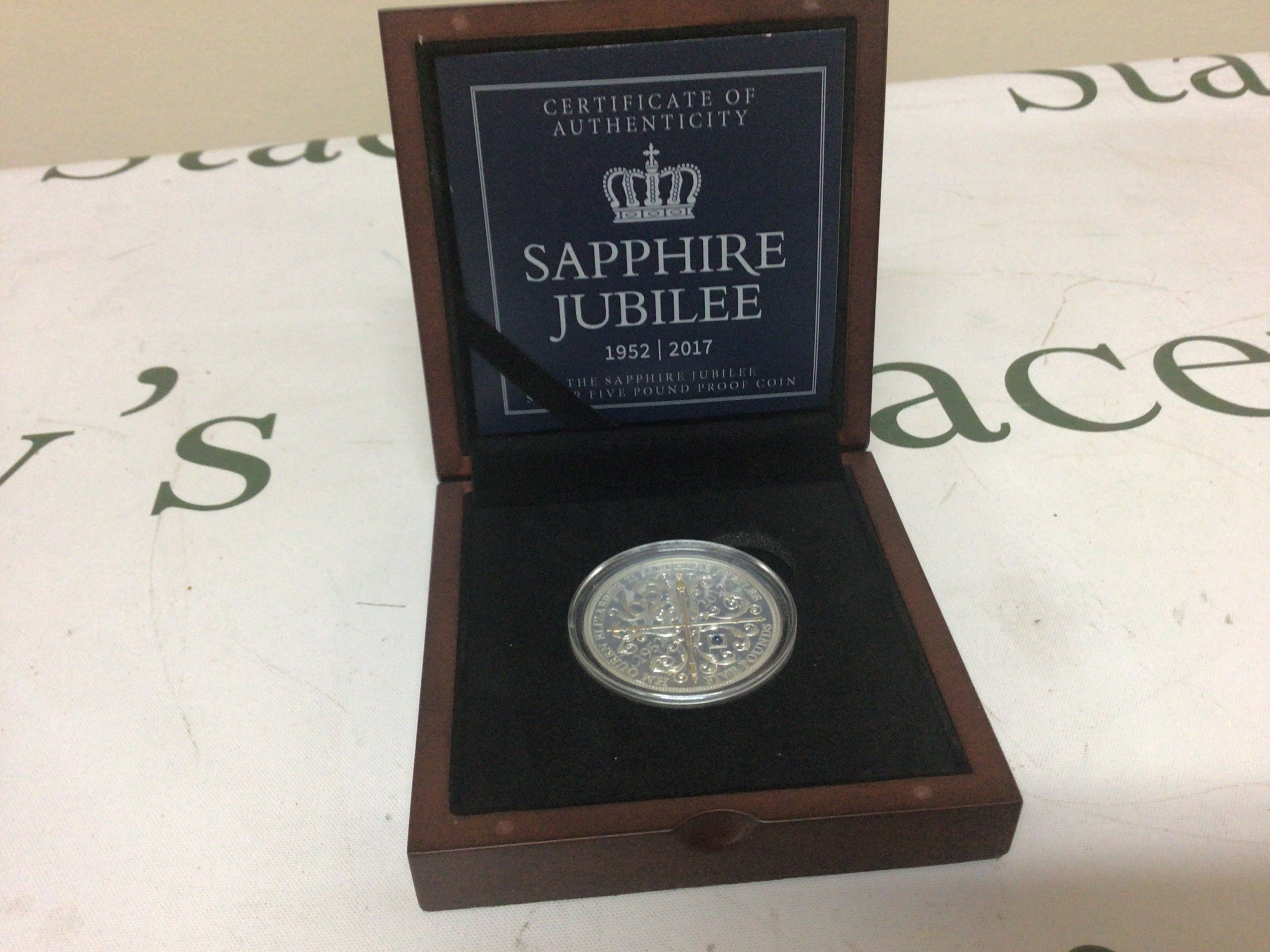 A Sapphire Jubilee Silver proof &#20132662755 coin in a fitted box with certificate of authenticity one ounce.