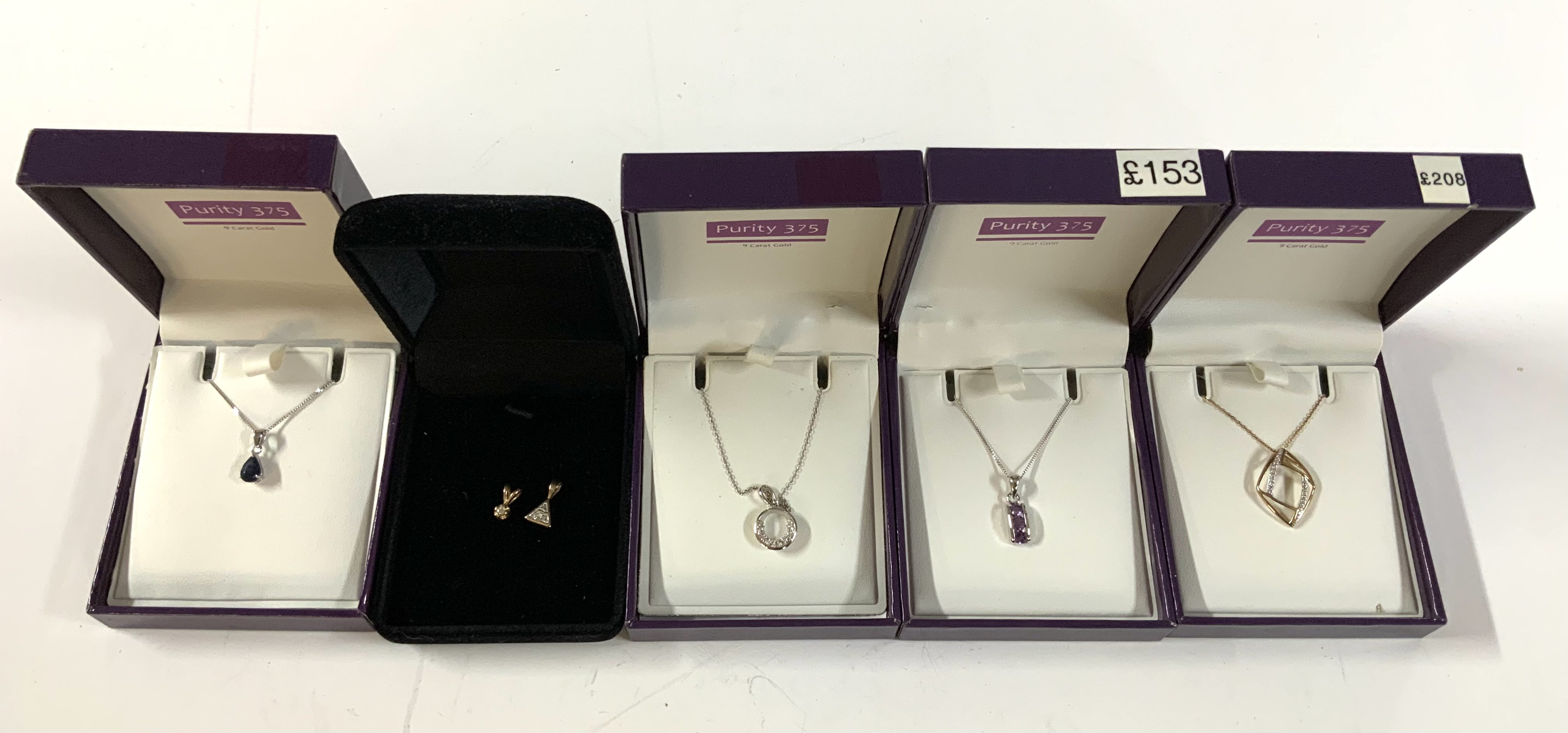 5 9ct gold (Purity 375) pendants and chains.