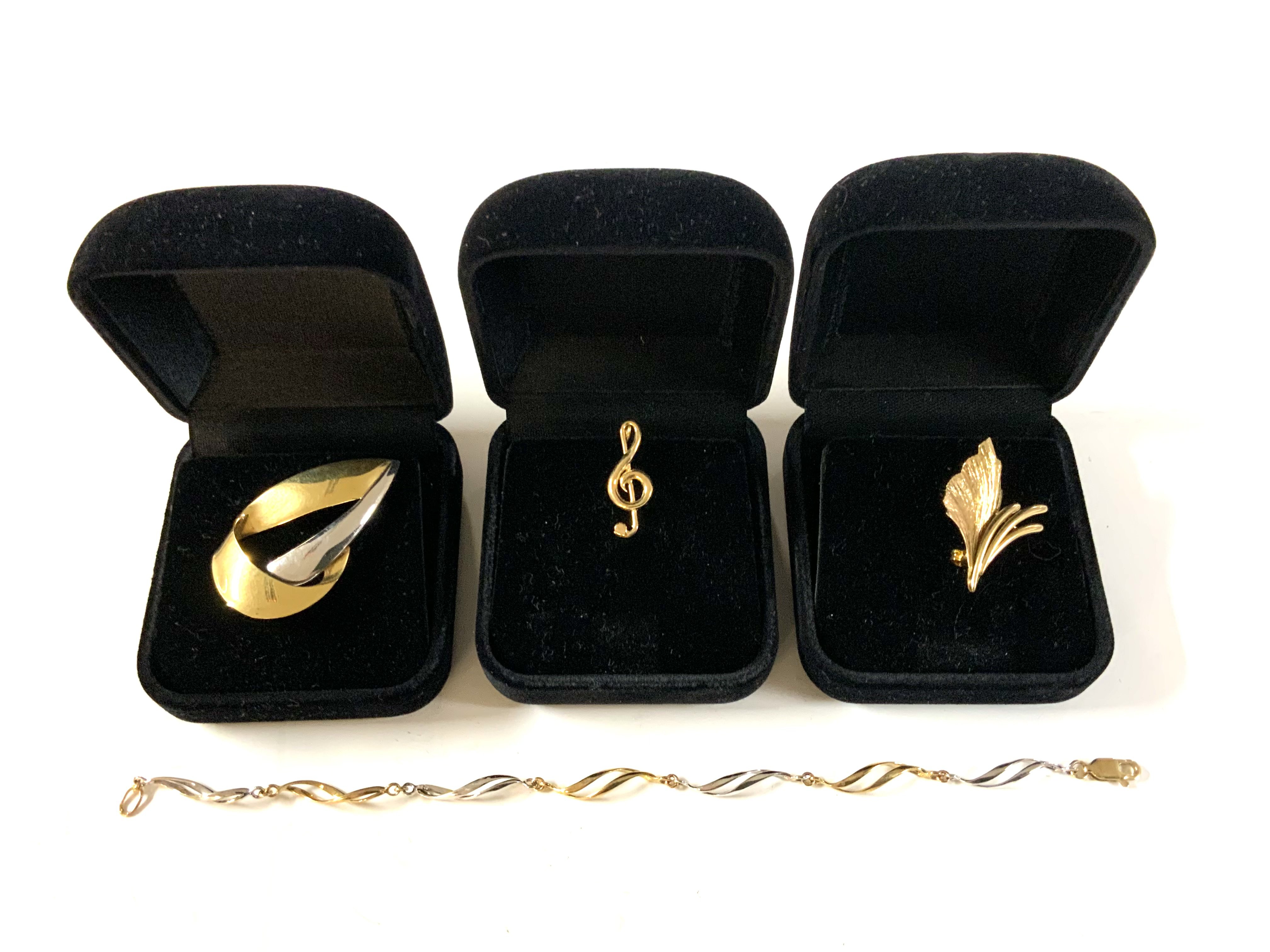 3 9ct gold brooches together with a 9ct gold resist bracelet. (A)