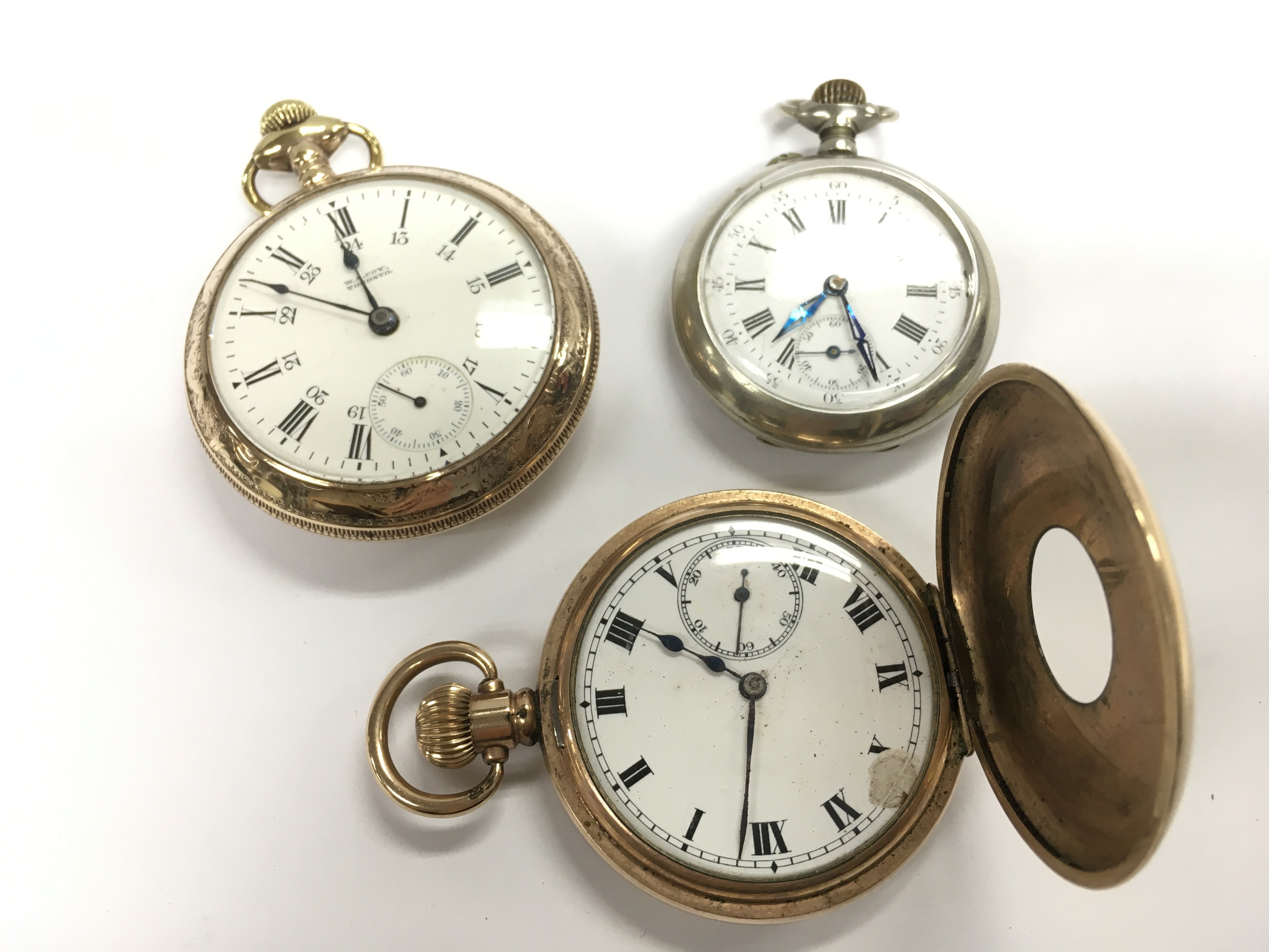 Three vintage pocket watches half hunter , Dennison case, Gold plated W.A COY Waltham case. All working