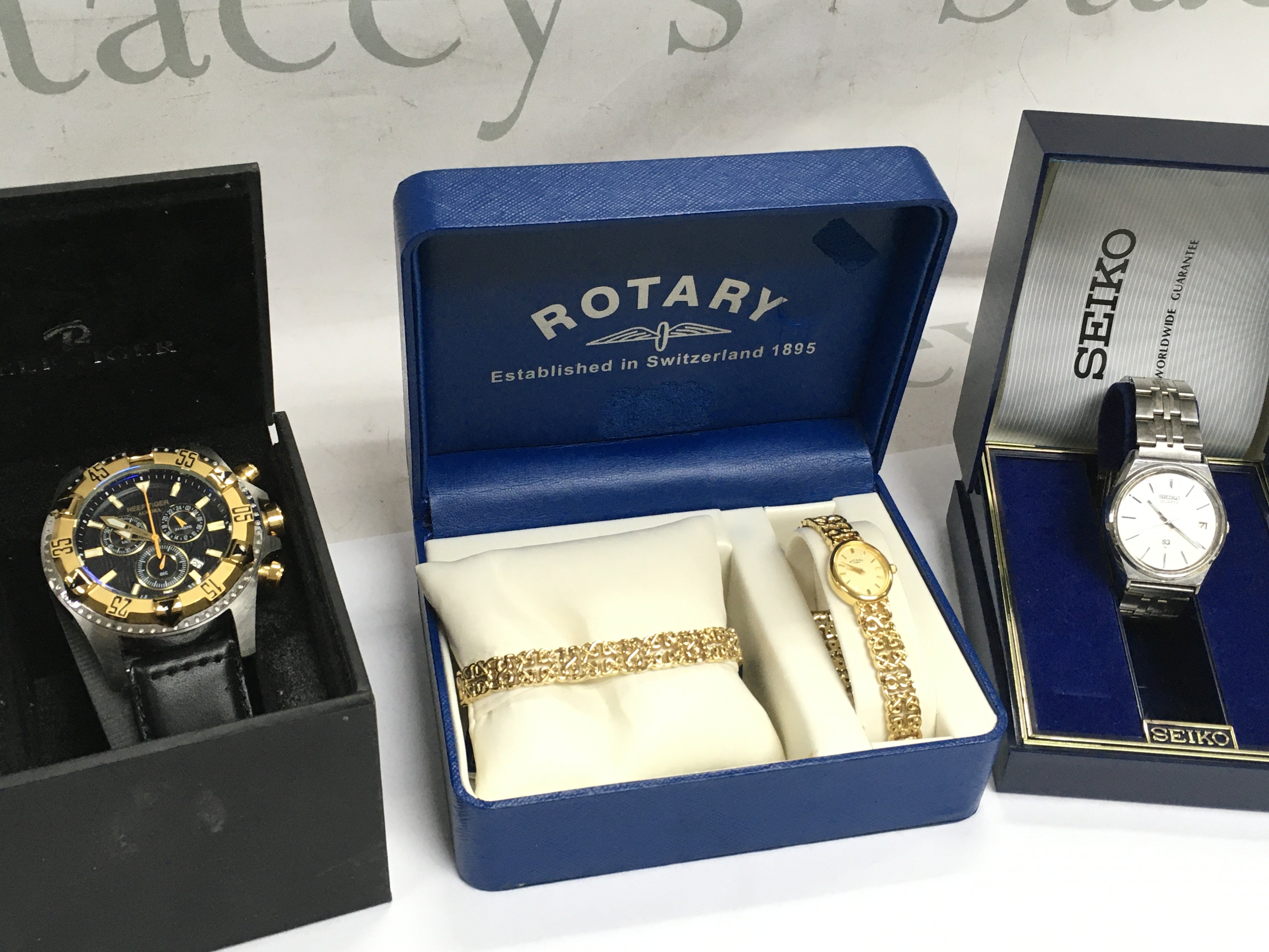 A boxed Seiko 50, Reef tiger mens watch , a ladies rotary boxed working. Postage category B