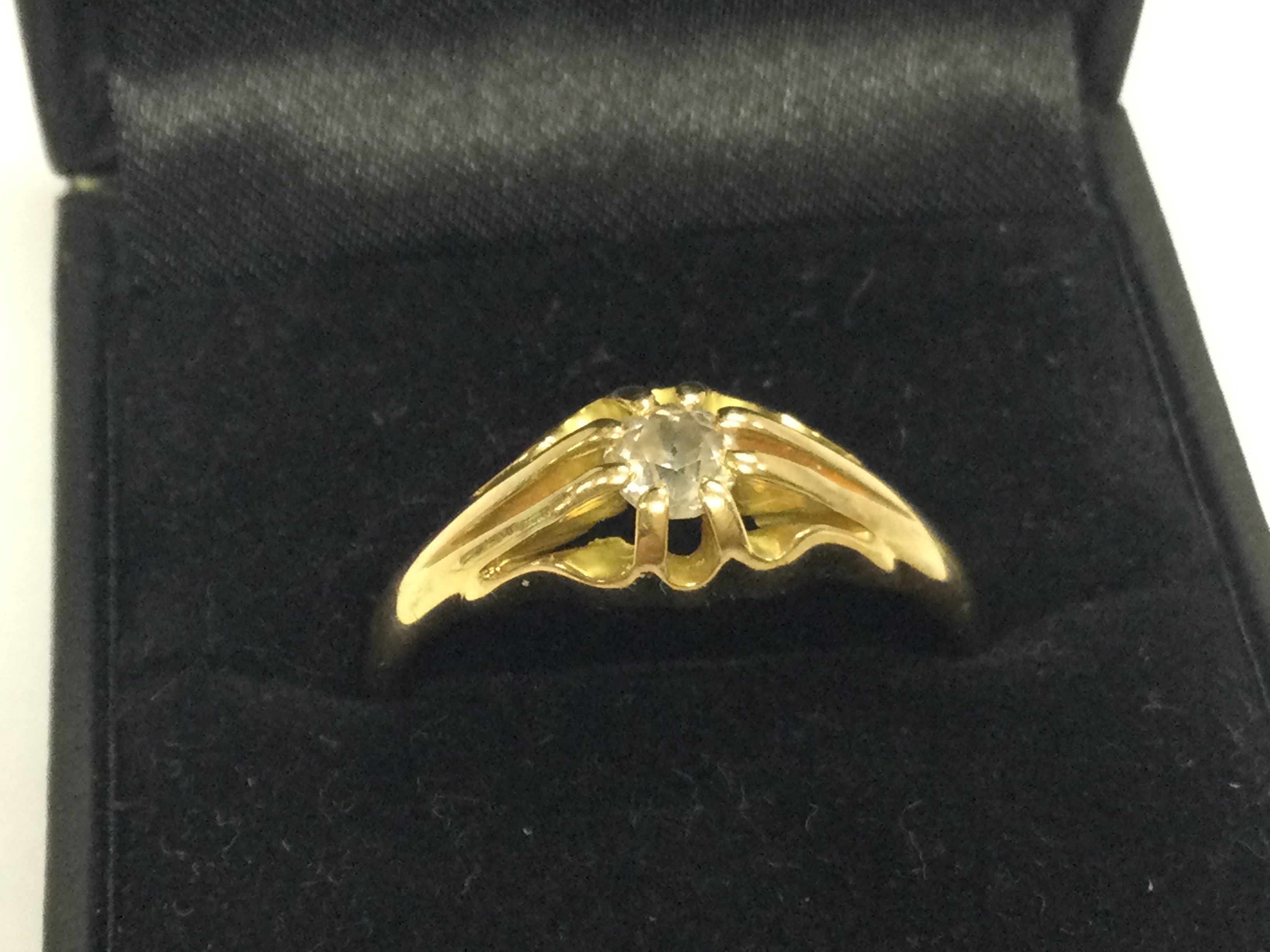 An 18ct gold old cut diamond ring size U. 4.5g total weight. Postage category A