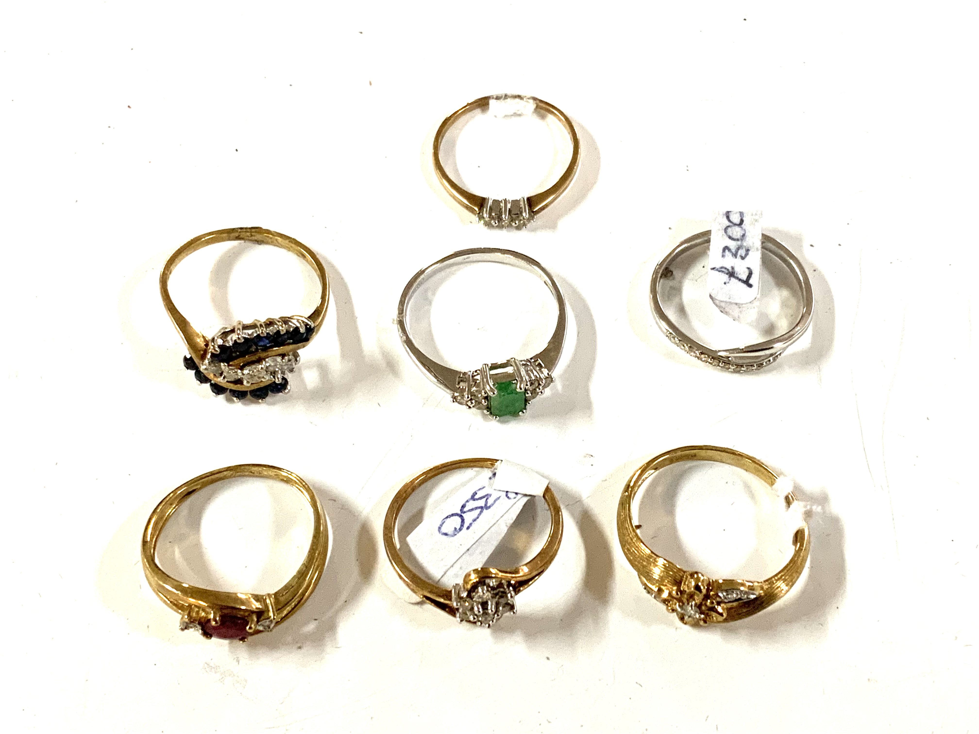 7 9ct gold and stone set rings. (A)