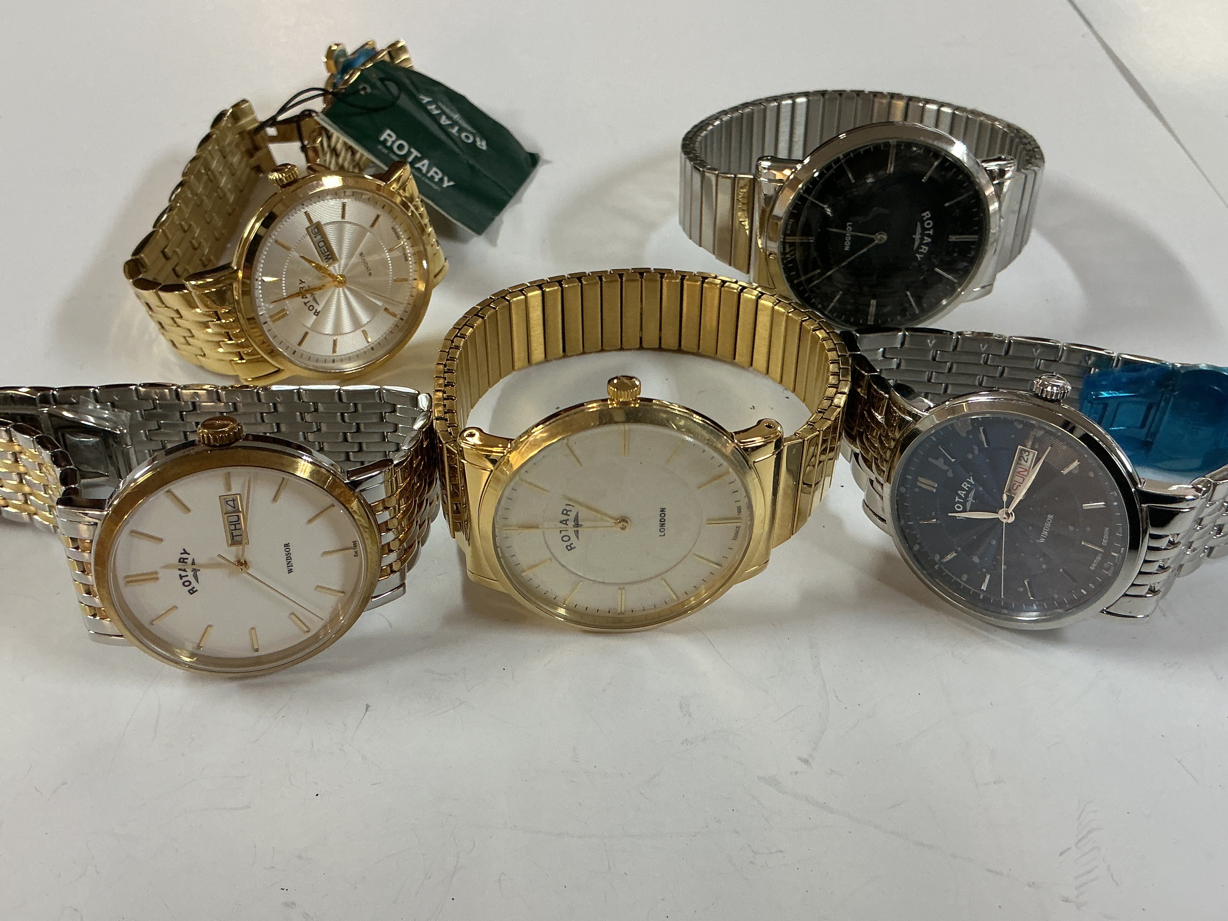 five new gents rotary watches.