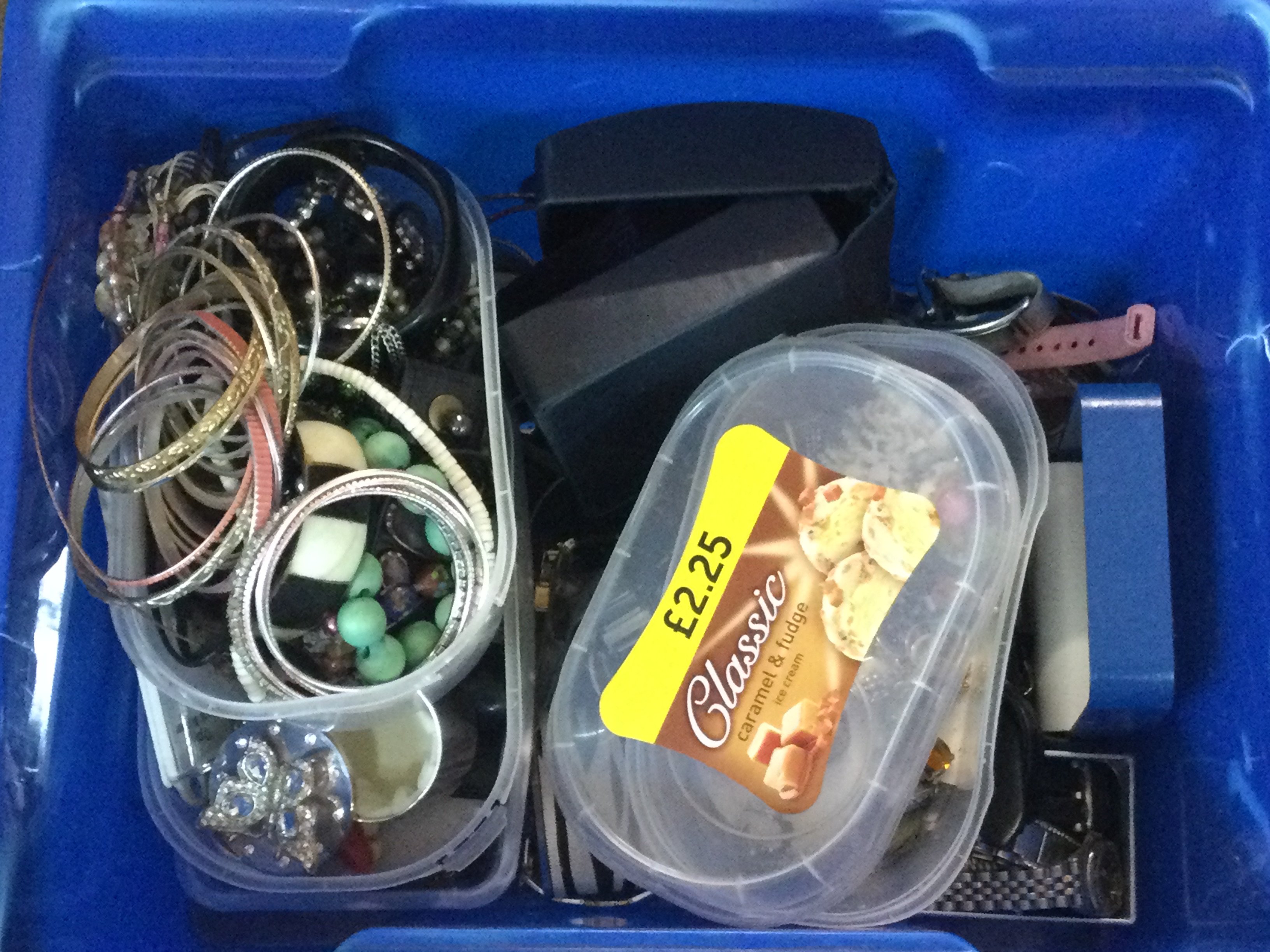 A box of varied costume jewellery including watches including Sekonda , Seiko , bracelets etc . Postage category C