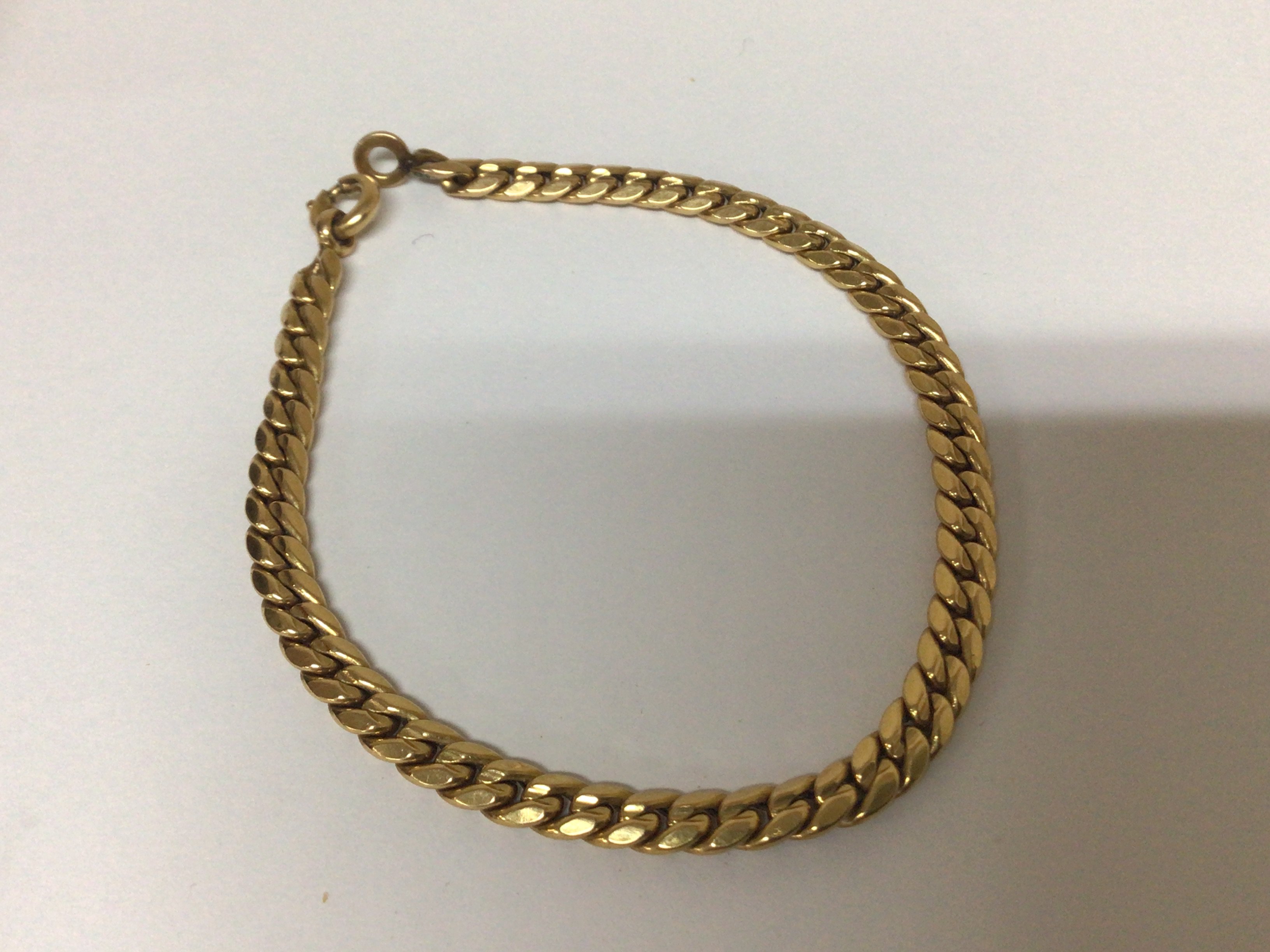 A slab sided 18carat gold bracelet marked 750 weight 6.5g