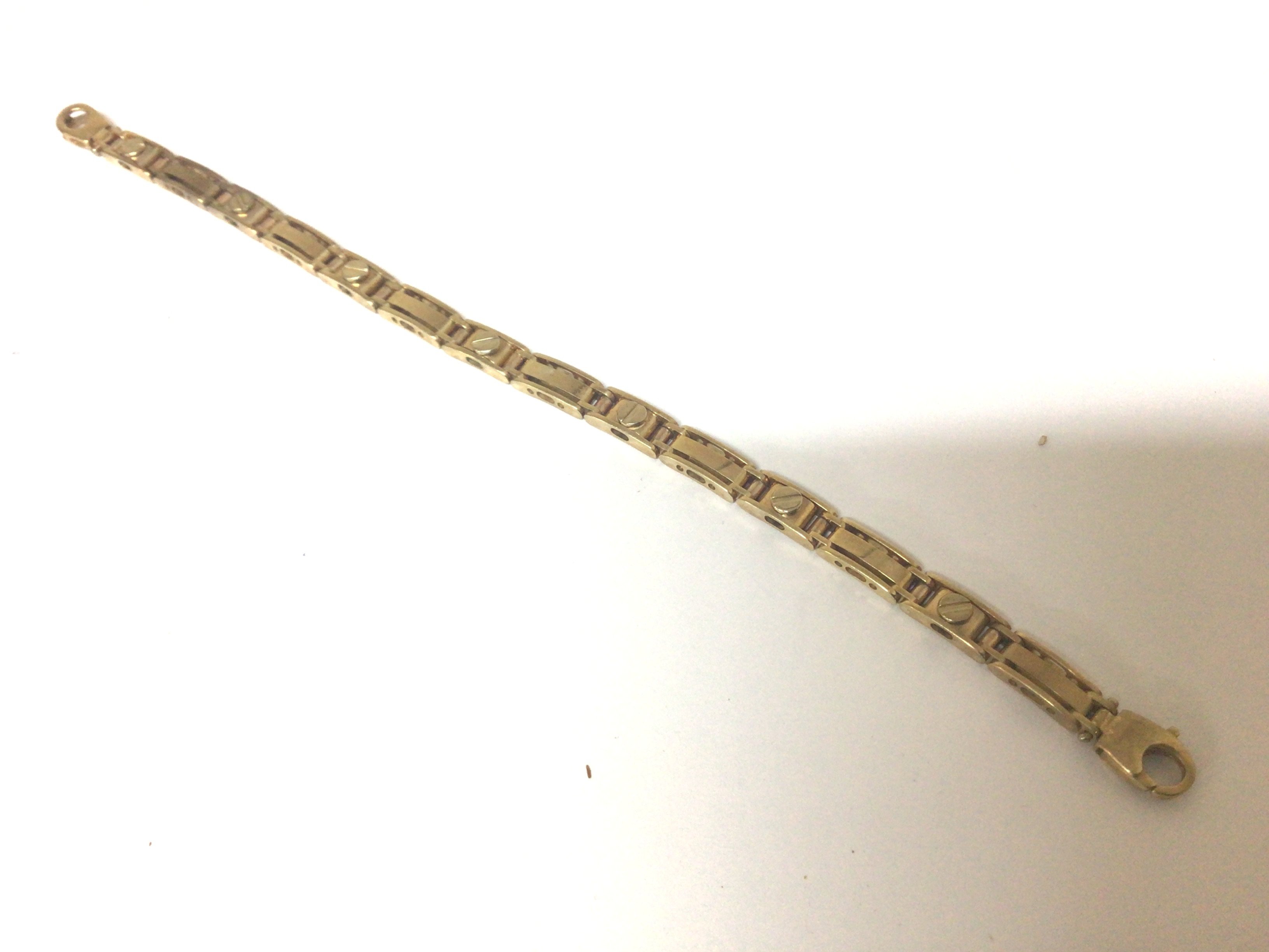 A Cartier Style bracelet with alternating links with screw heads weight 16g