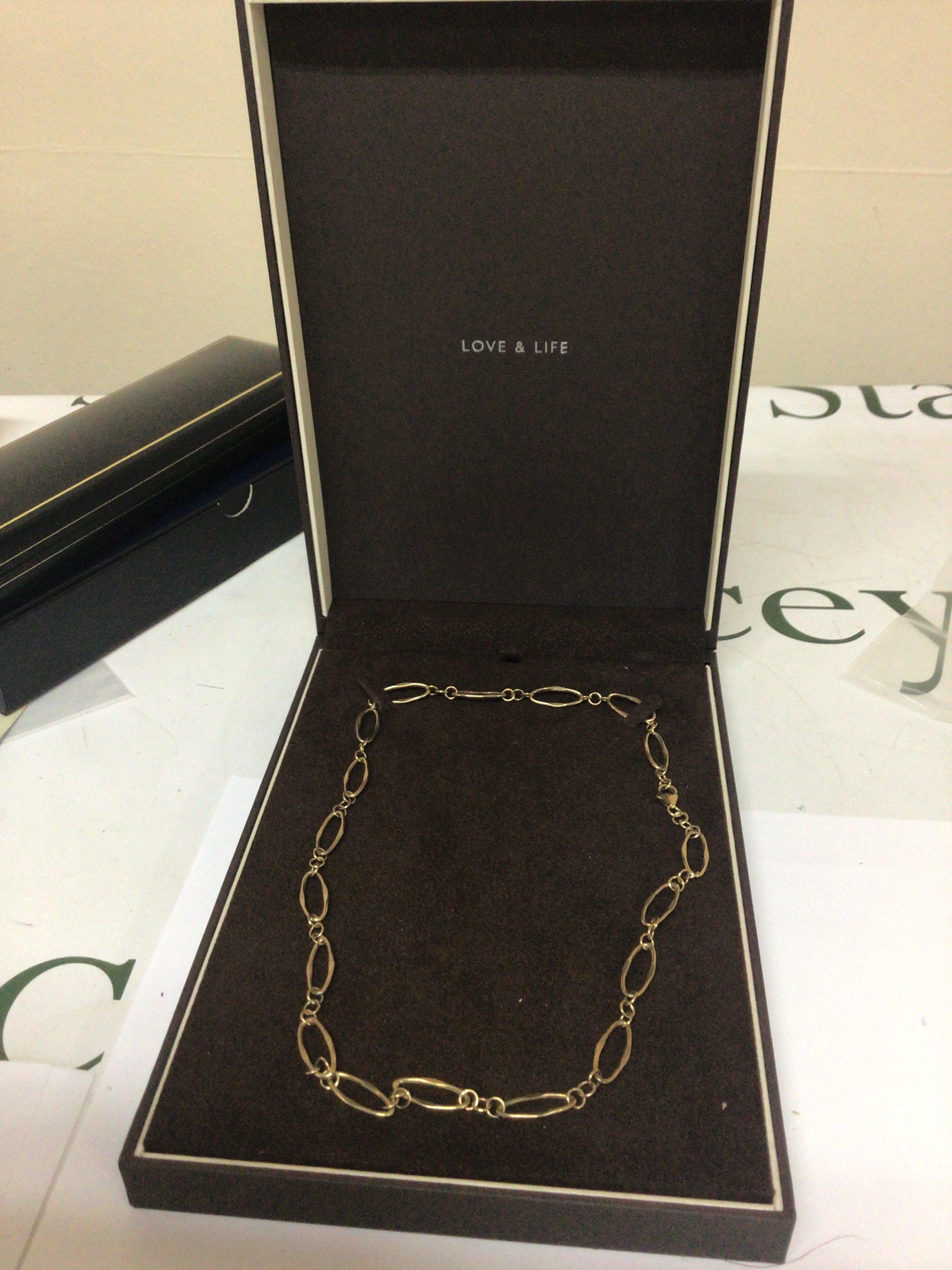 An Ernest Jones 9carat gold open link 9carat gold bracelet in a fitted box weight 5.5g
