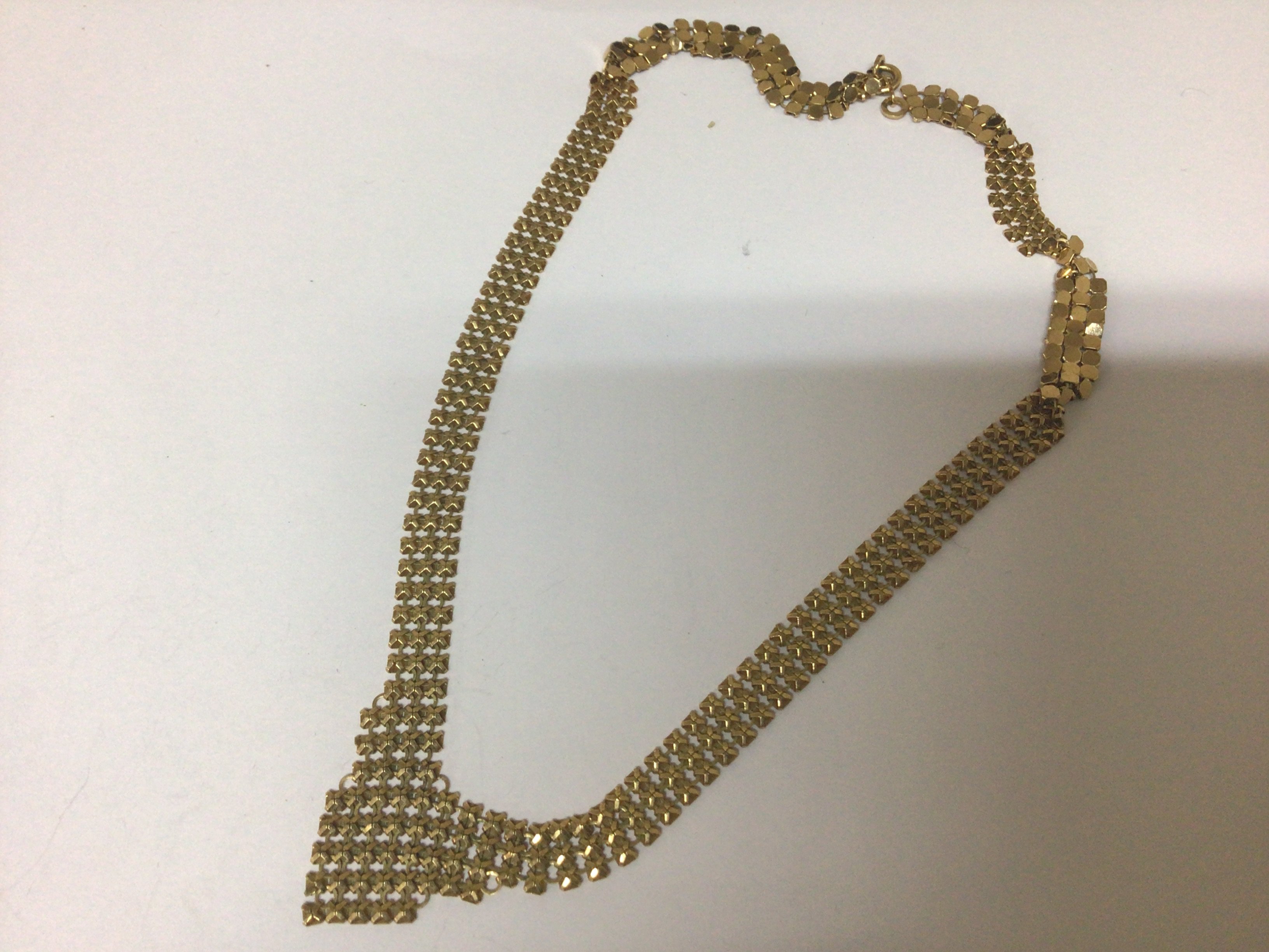 A modern design 9carat gold chain mail effect necklaces. Weight 10g