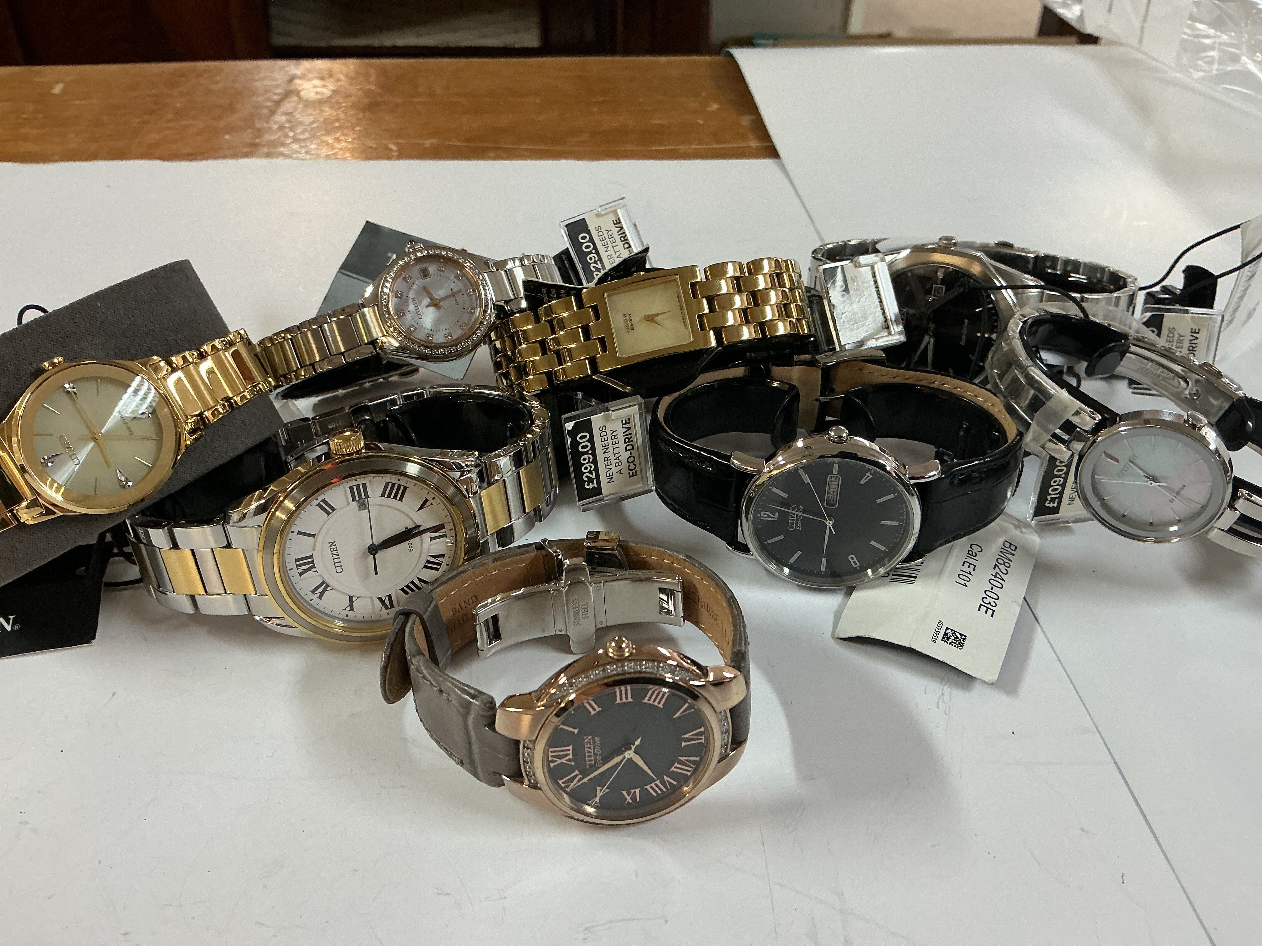 Nine mixed citizen eco drive watches.