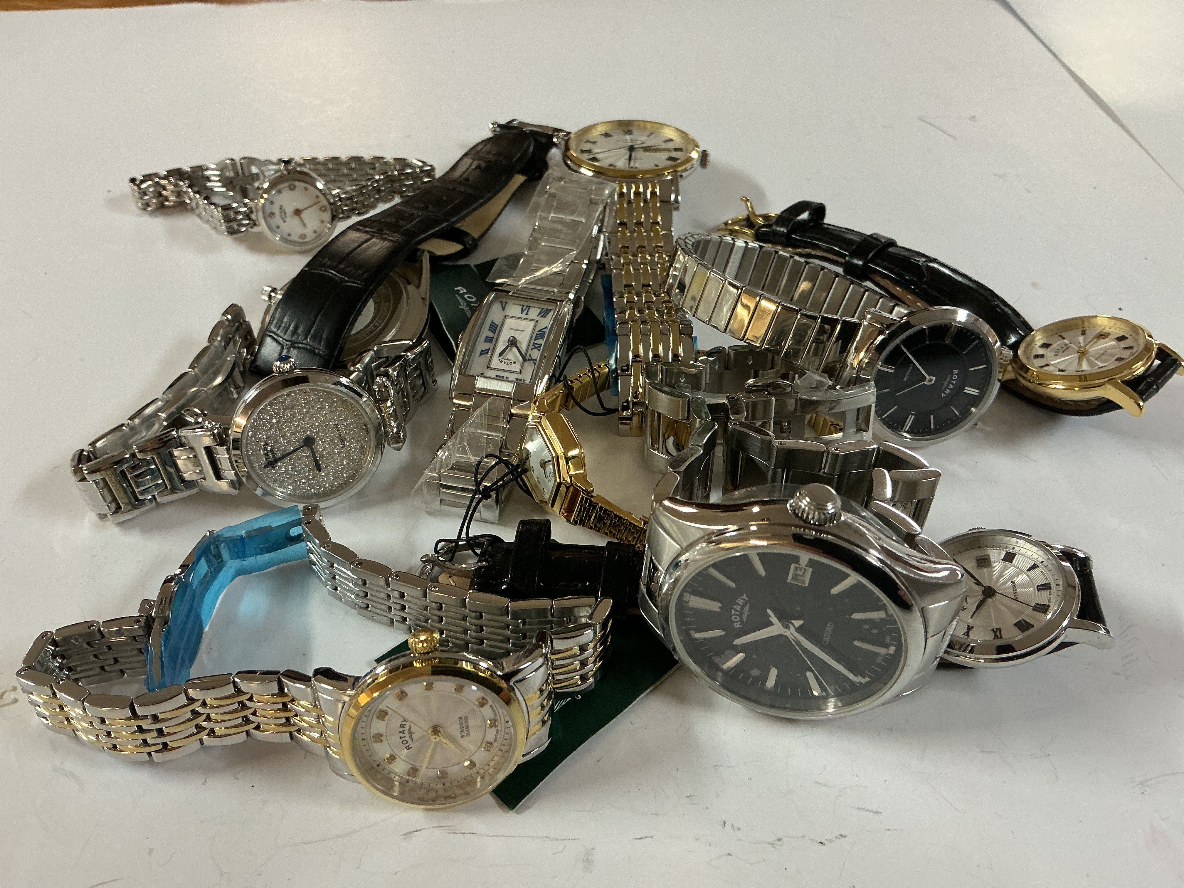 11 mixed ladies and gents rotary watches.