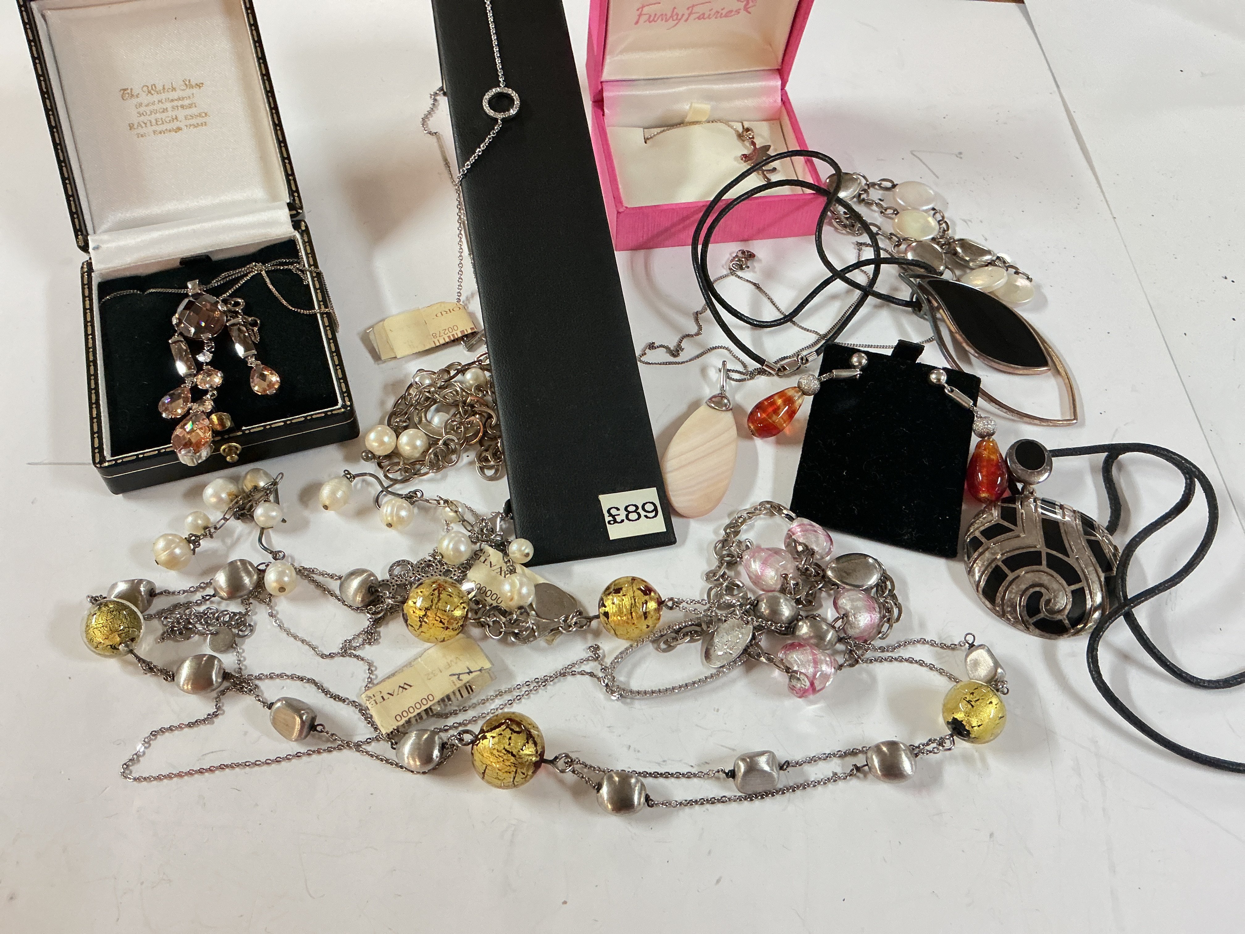 a mixed collection of 92 stamped silver jewellery including bracelets, necklaces and pendants.