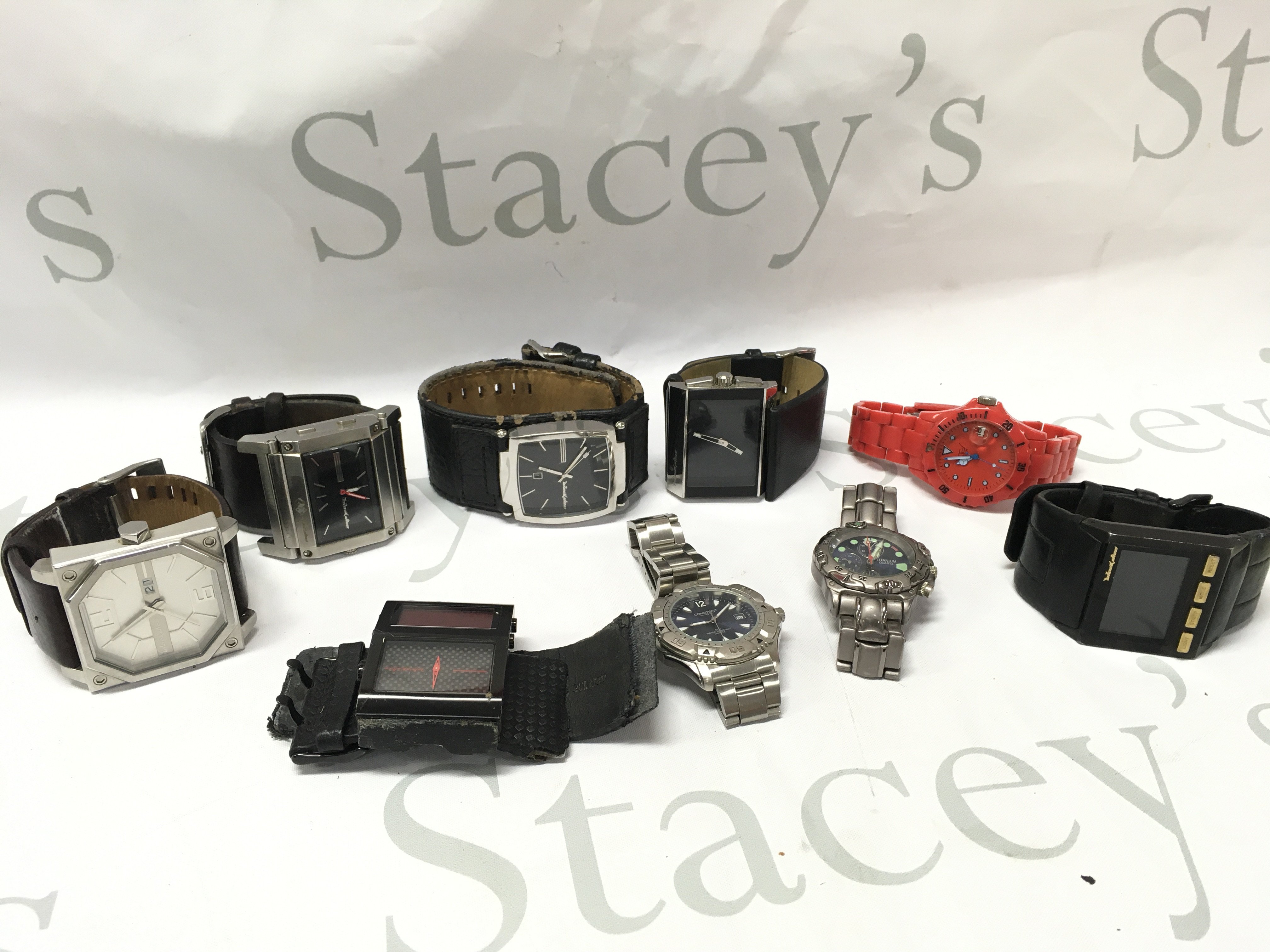 A Collection of used not working large black dice watches and other watches . Postage category A