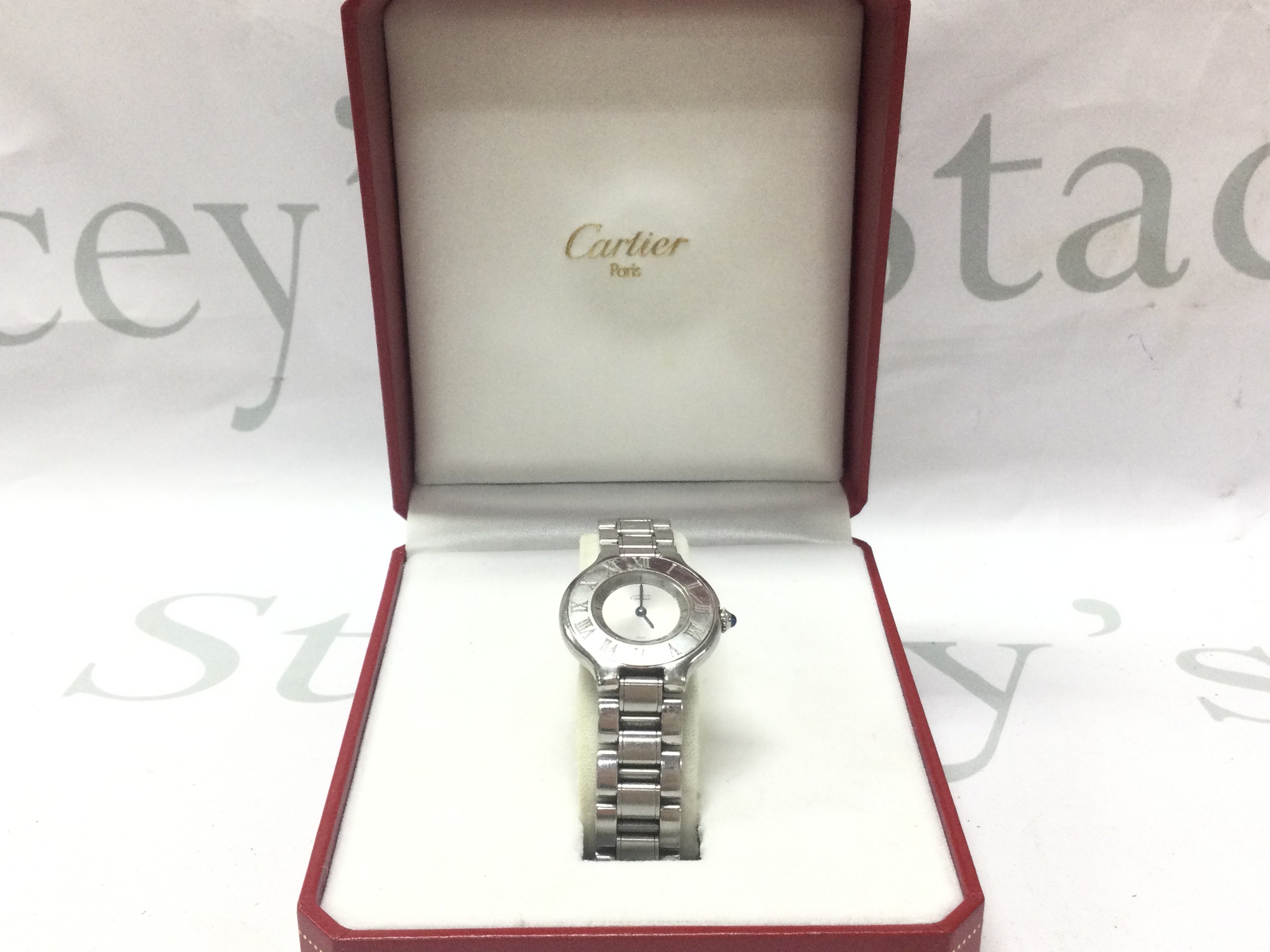 A boxed Cartier Must De Womens watch .postage category A