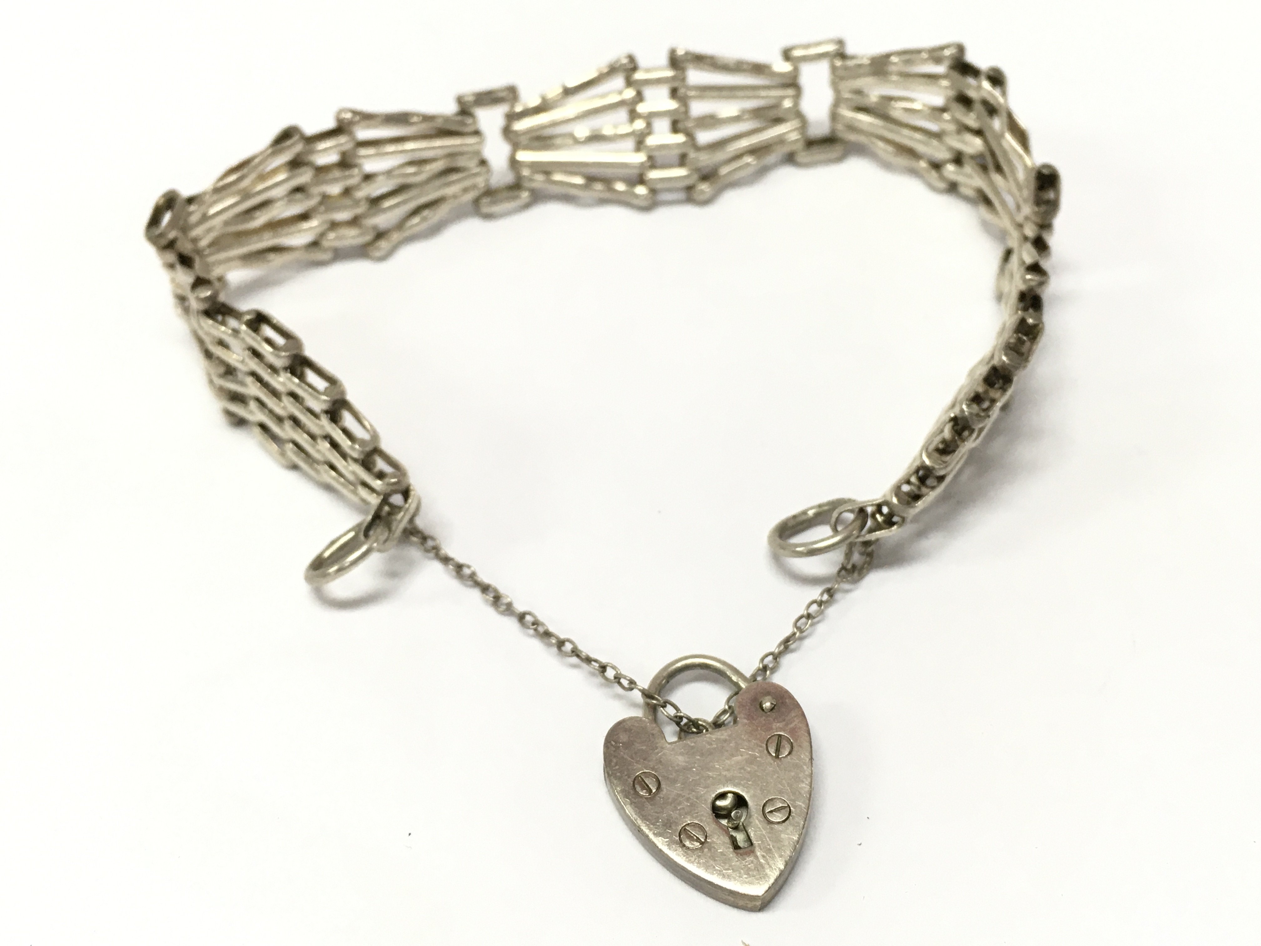 a silver hallmarked gate bracelet . 17.4g total weight. Postage category A