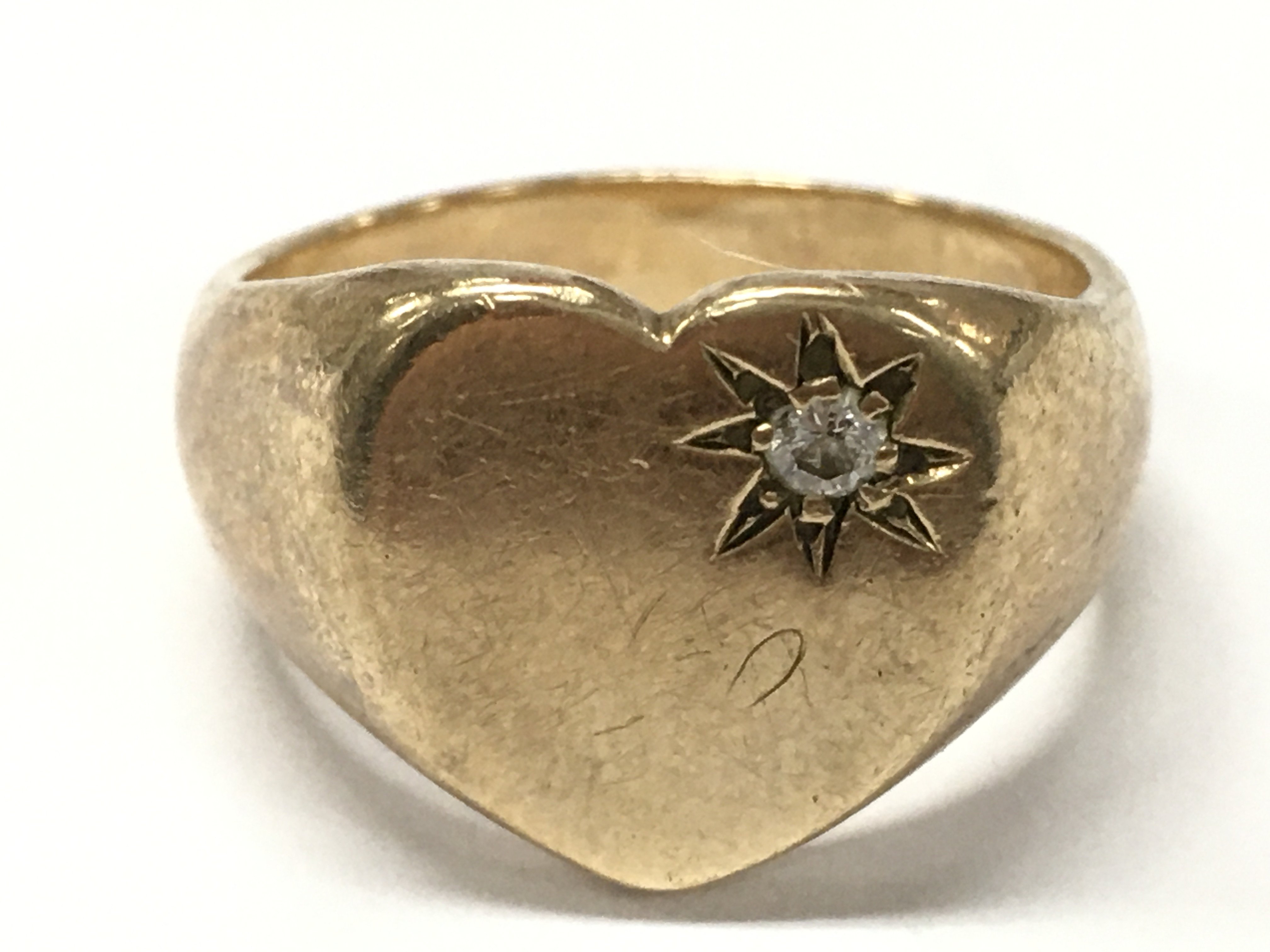 An unmarked gold Gents ring, size S , 10.4g total weight. postage catA