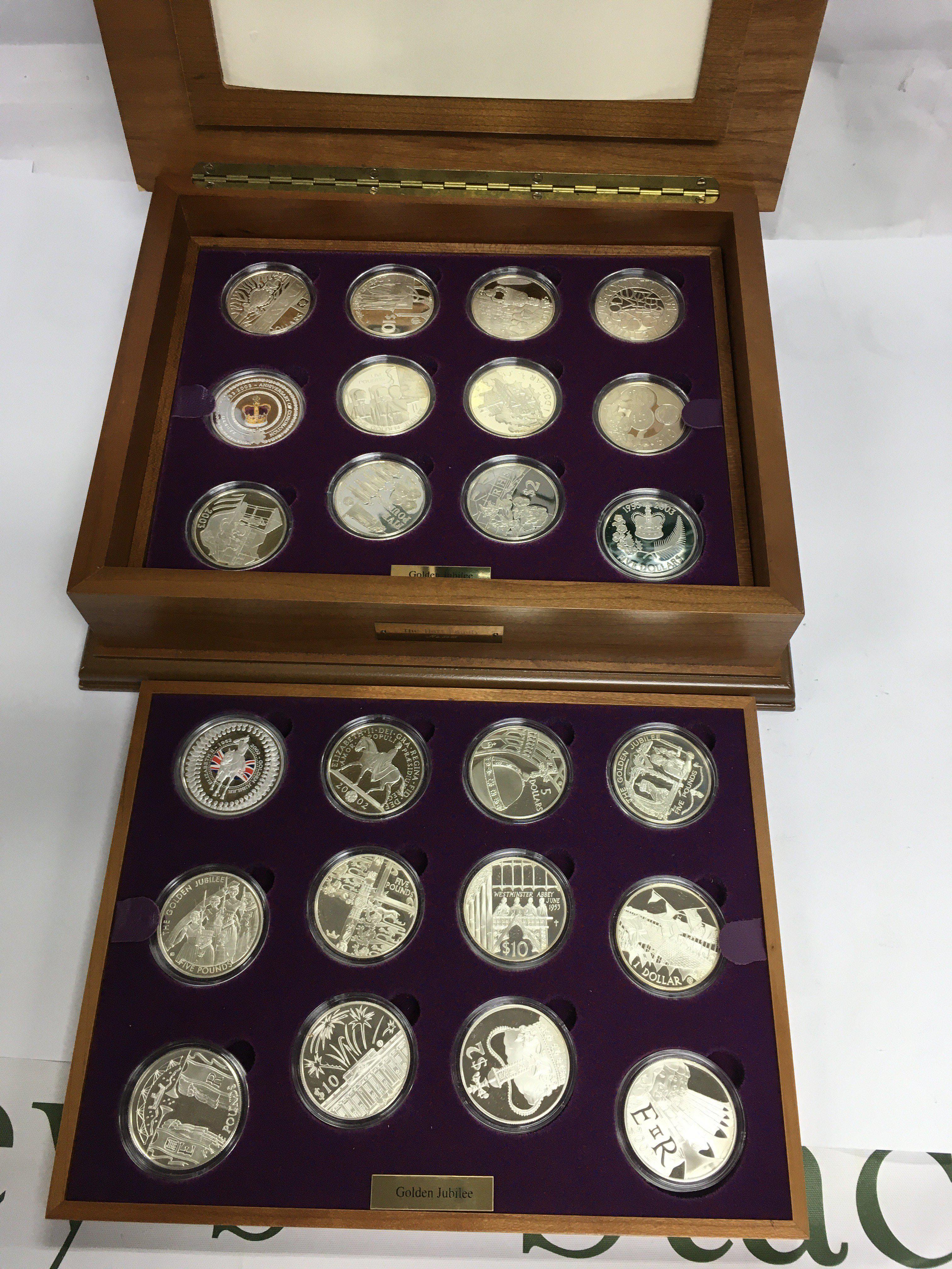 A cased Queen Elizabeth II Golden Jubilee Collection coin set. Shipping category C.