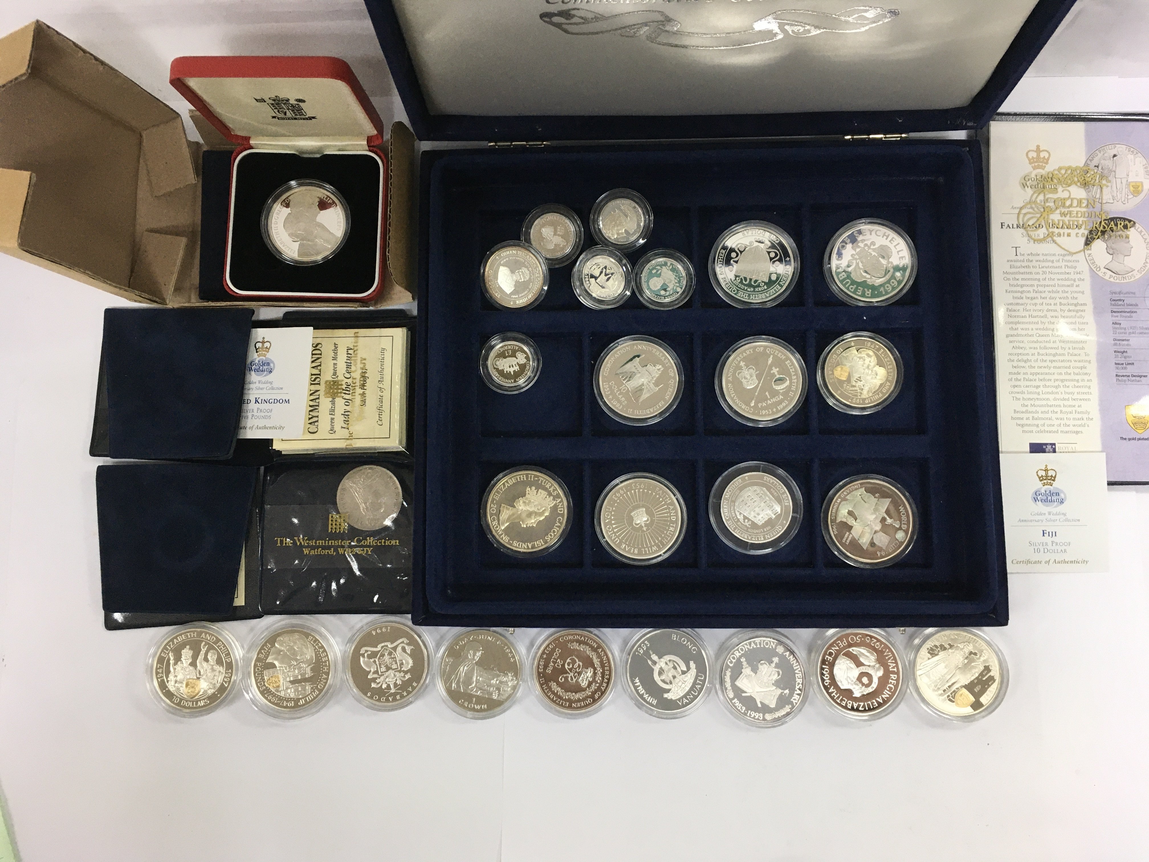 A case of mixed Commemorative coinage, some silver. Shipping category B.