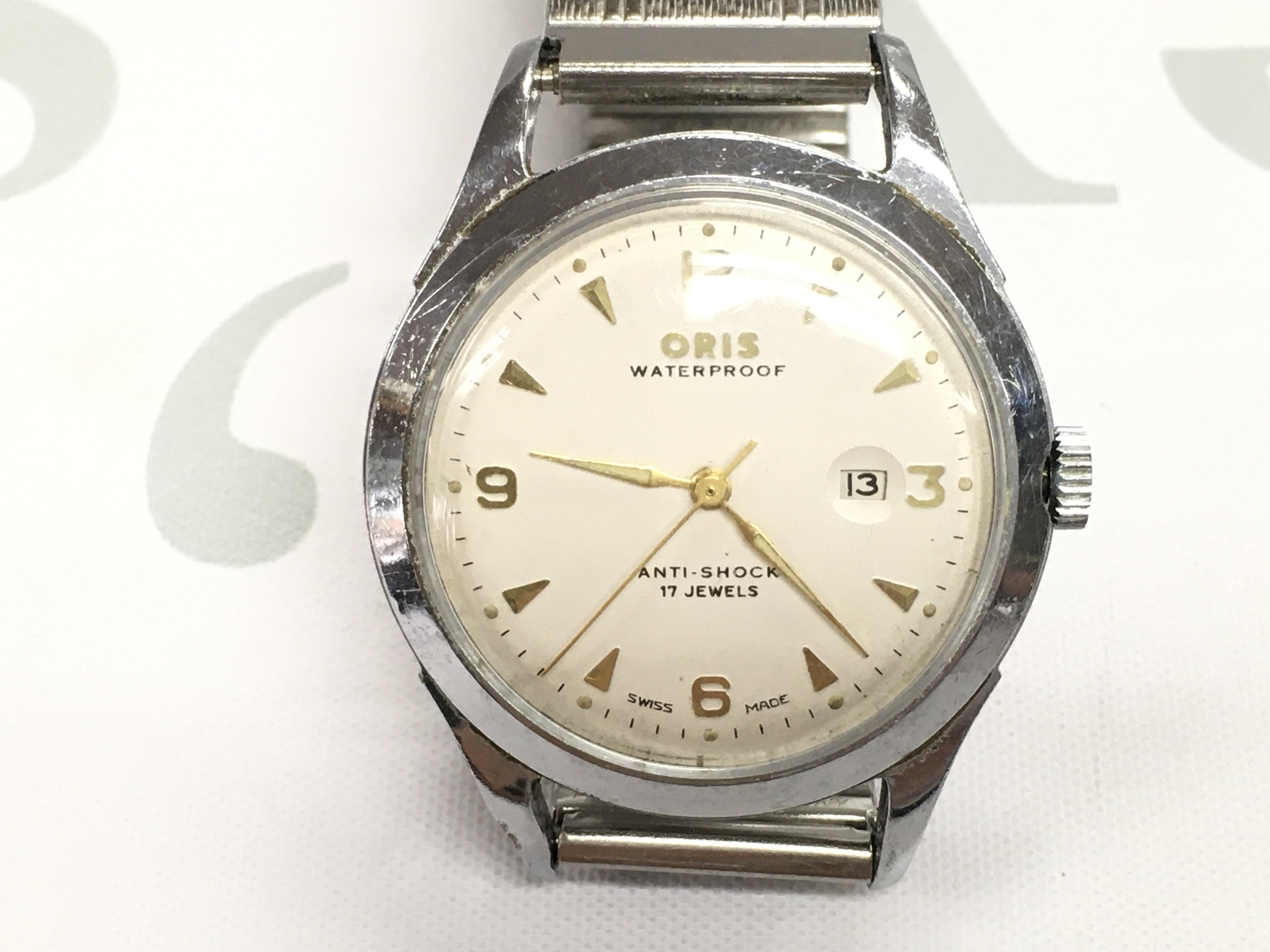 A vintage Oris gents wrist watch, winds and runs. On aftermarket strap. Postage B