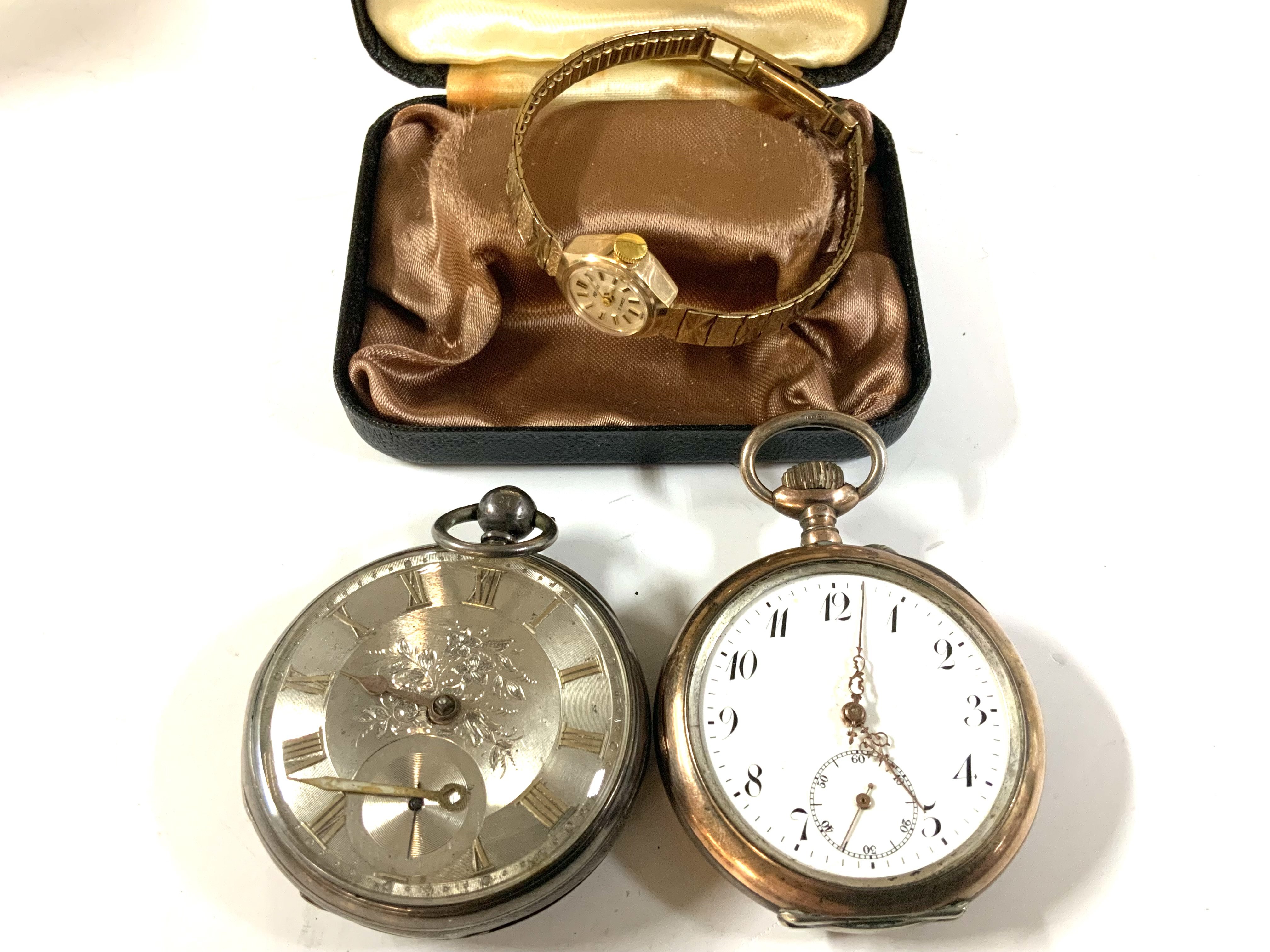 a ladies 9ct gold regent wristwatch together with 2 silver pocket watches.