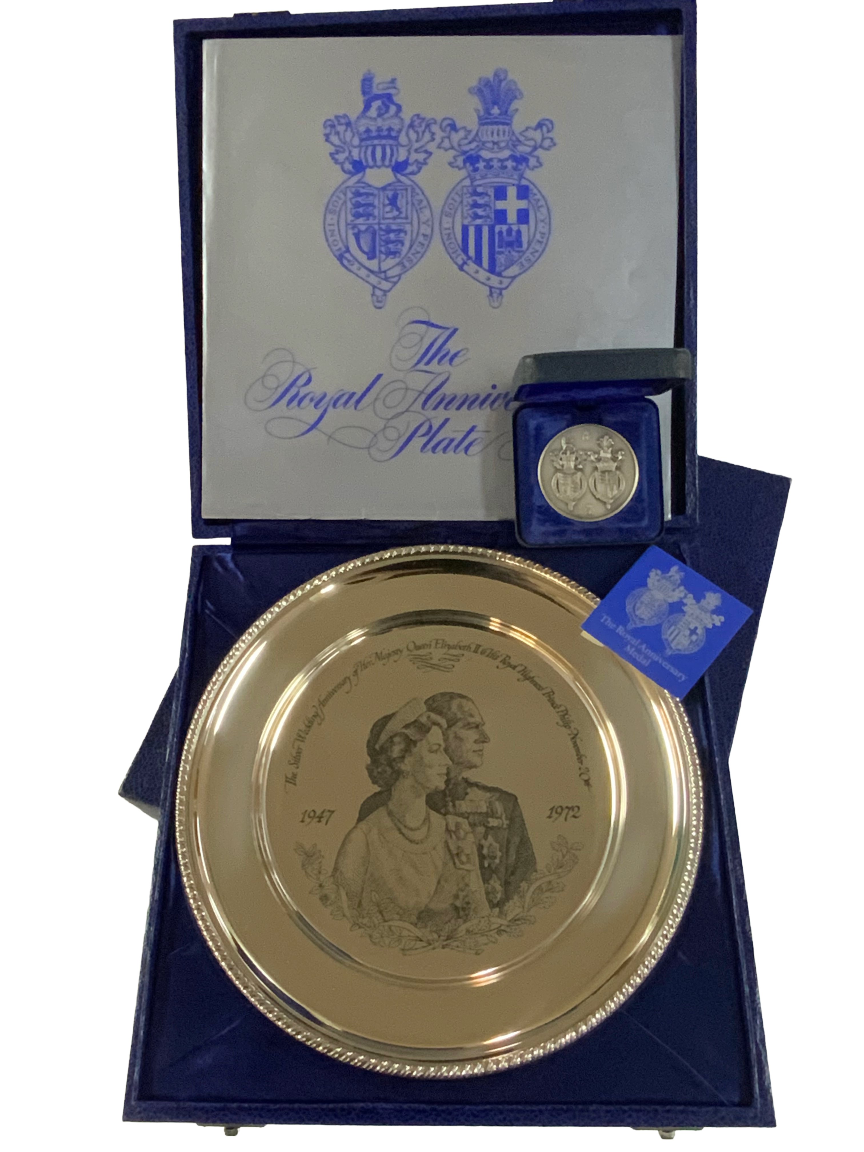 The Royal Anniversary sterling silver plate together with the Royal anniversary medal issued by John Pinches.