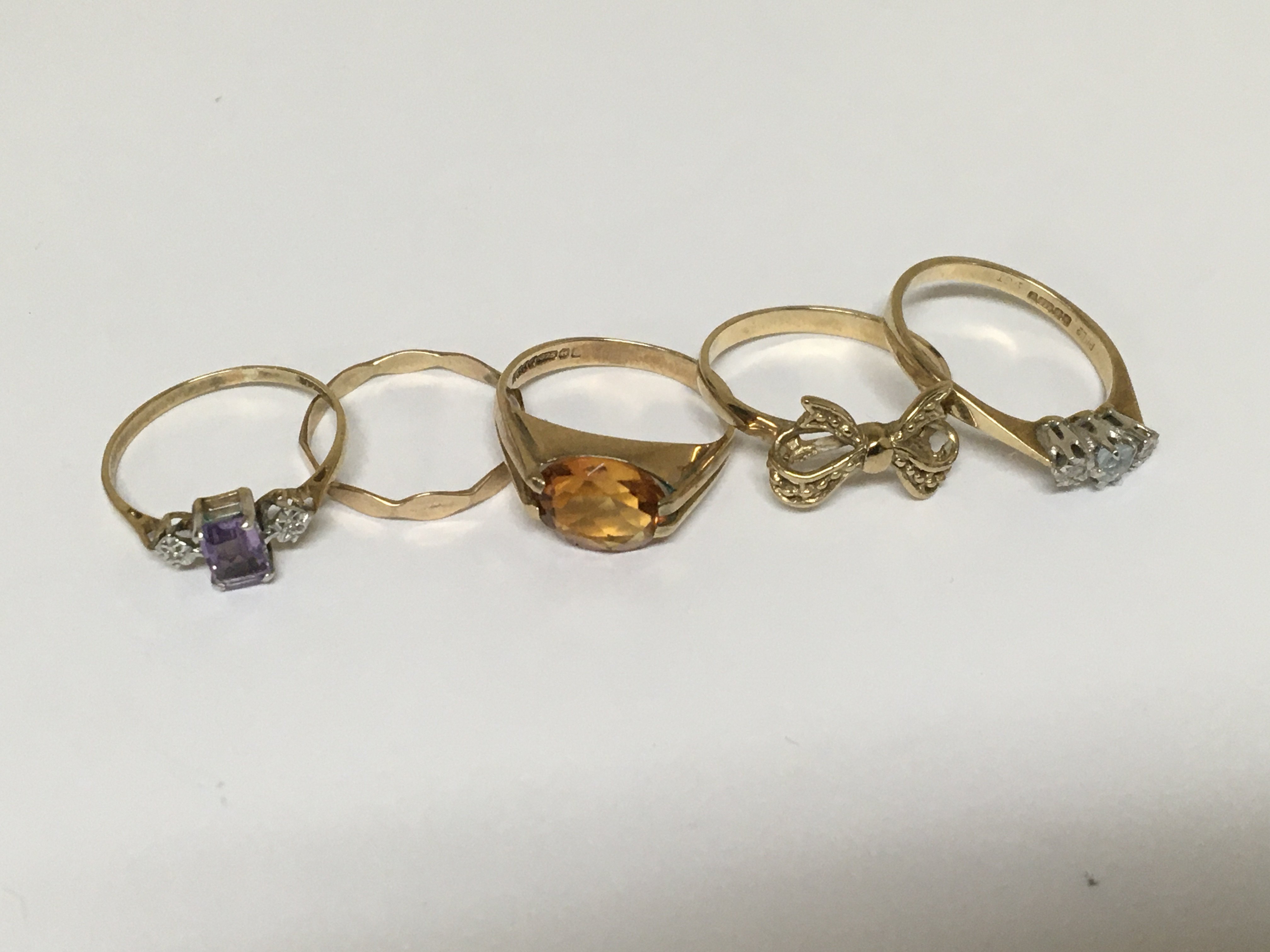 Five 9carat gold rings one set with an aquamarine a Citrine and others 7g (5)