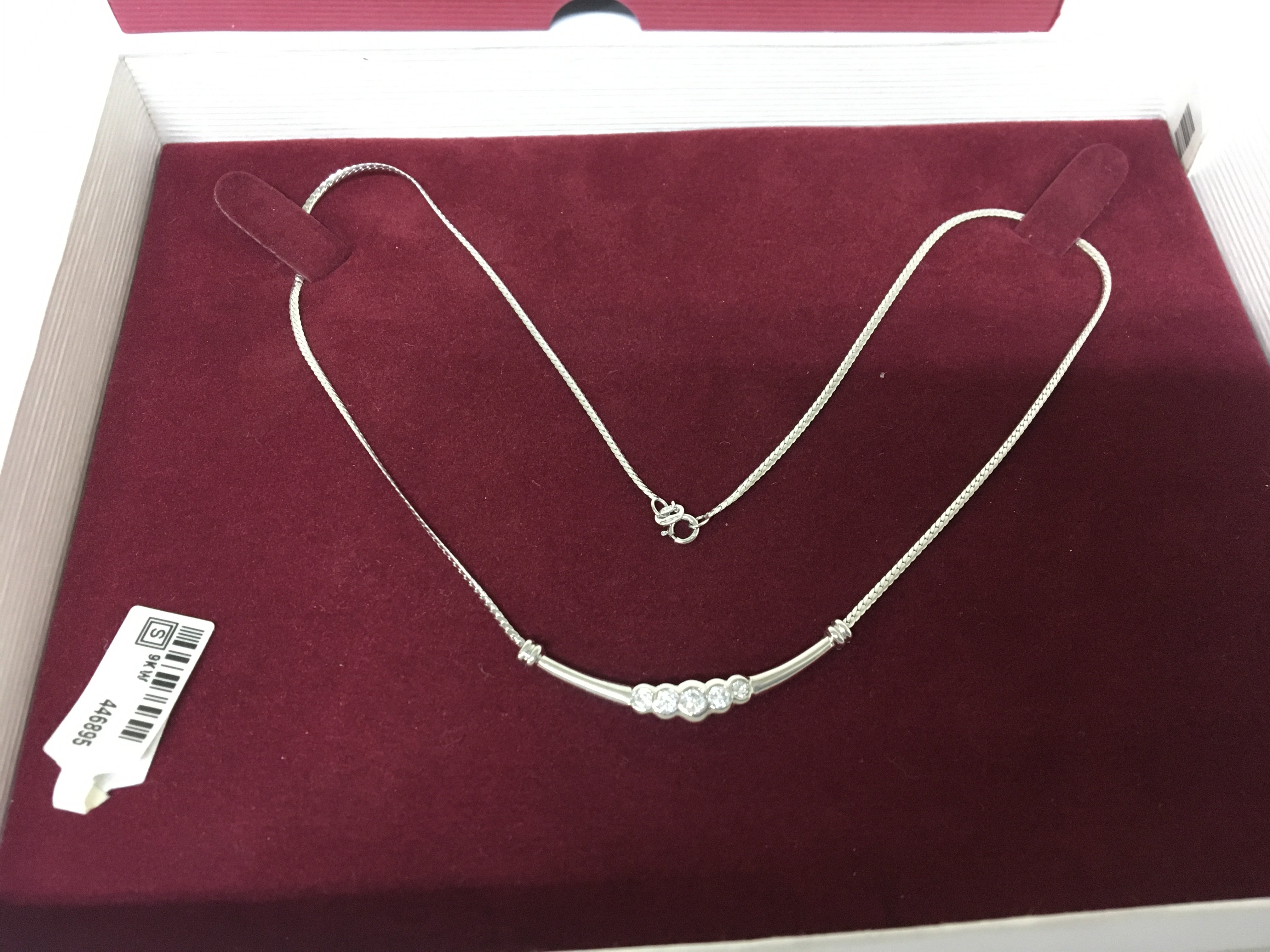 As new a white gold 9carat necklace in a fitted box H Samuels.