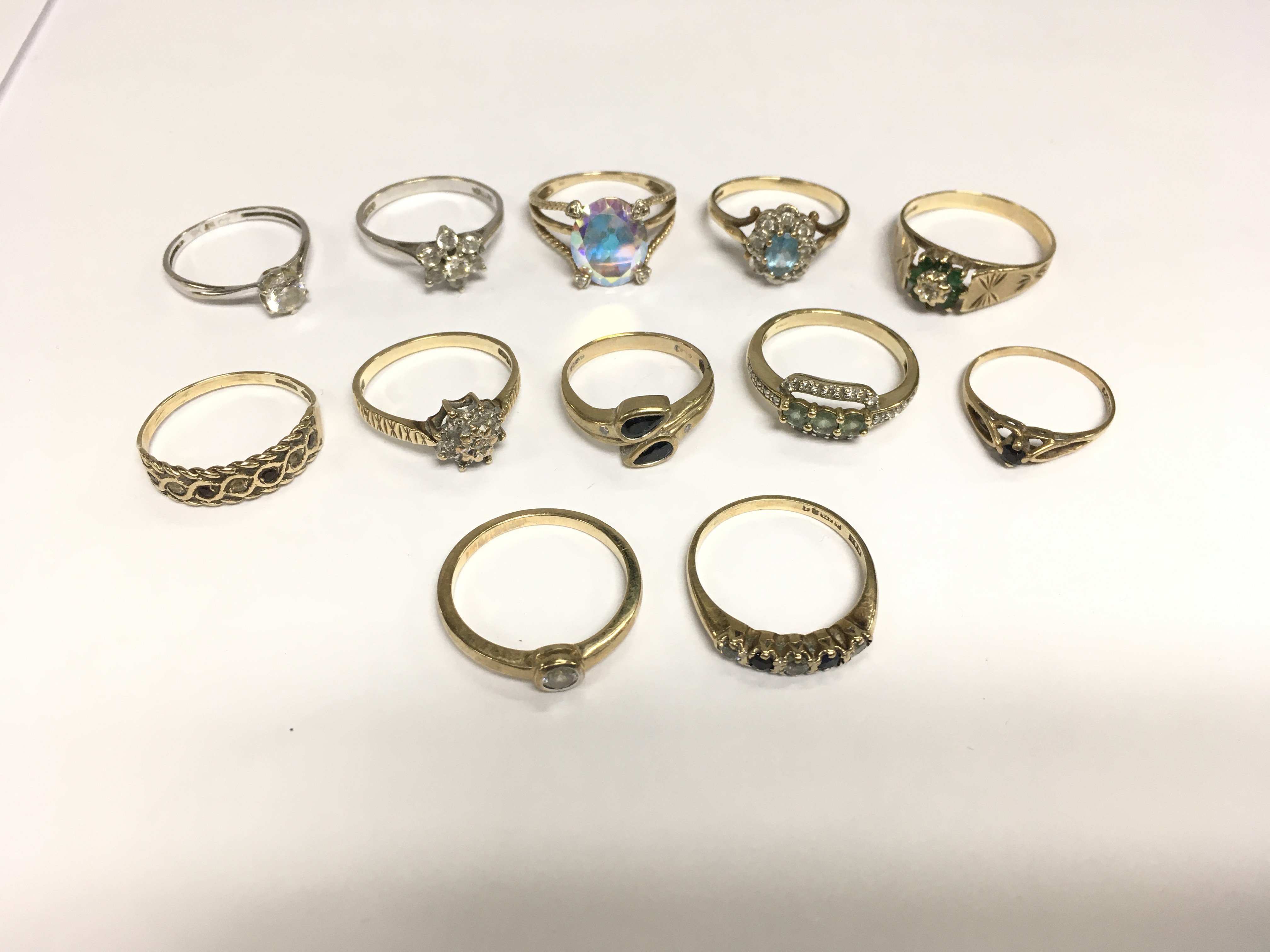 A collection of 9ct gold stone set rings, total approx weight 23.5g. Shipping category A.
