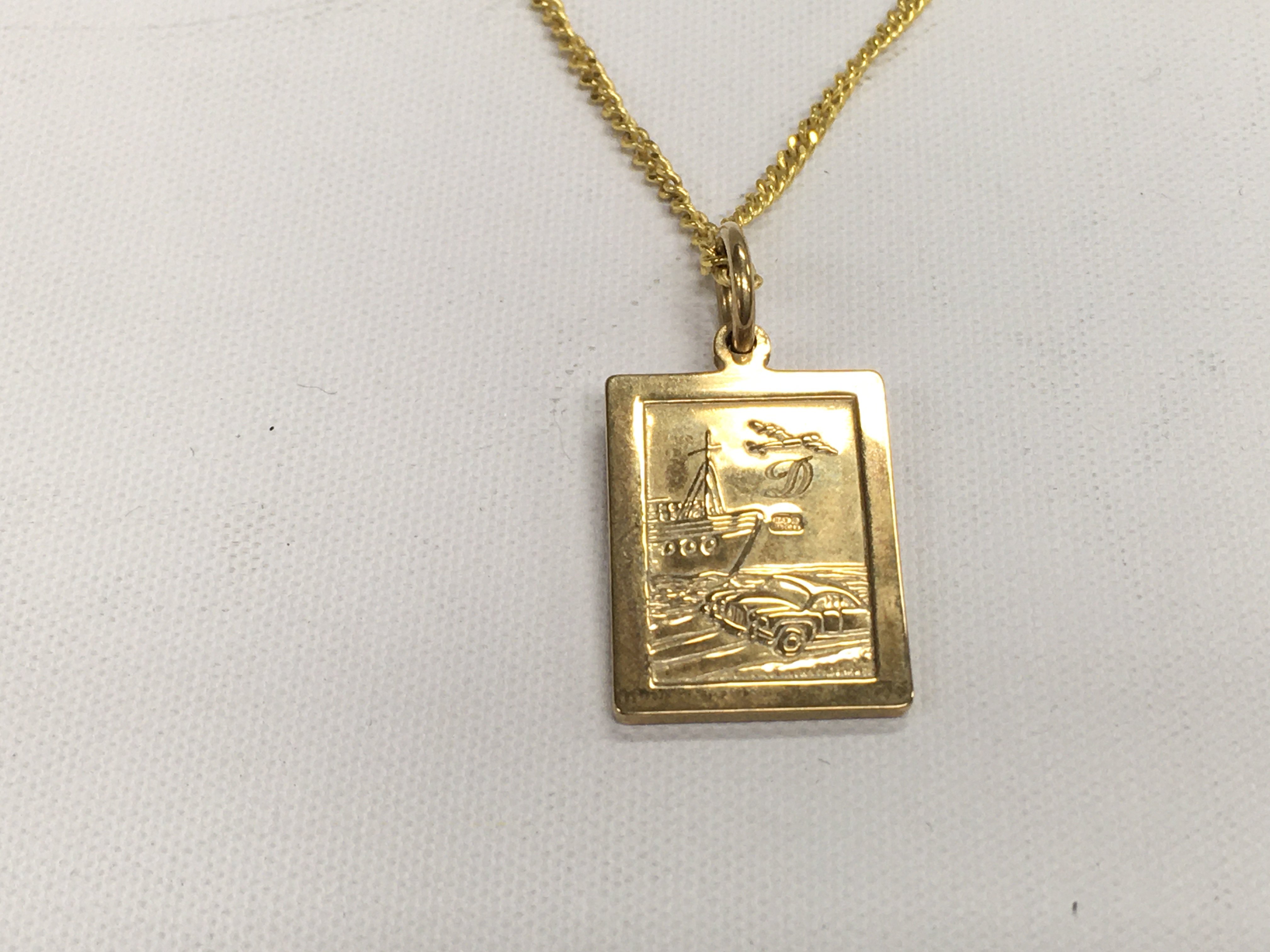 A 9ct gold st Christopher&#2013266057۪s pendant on a 9ct gold chain. 9.30g