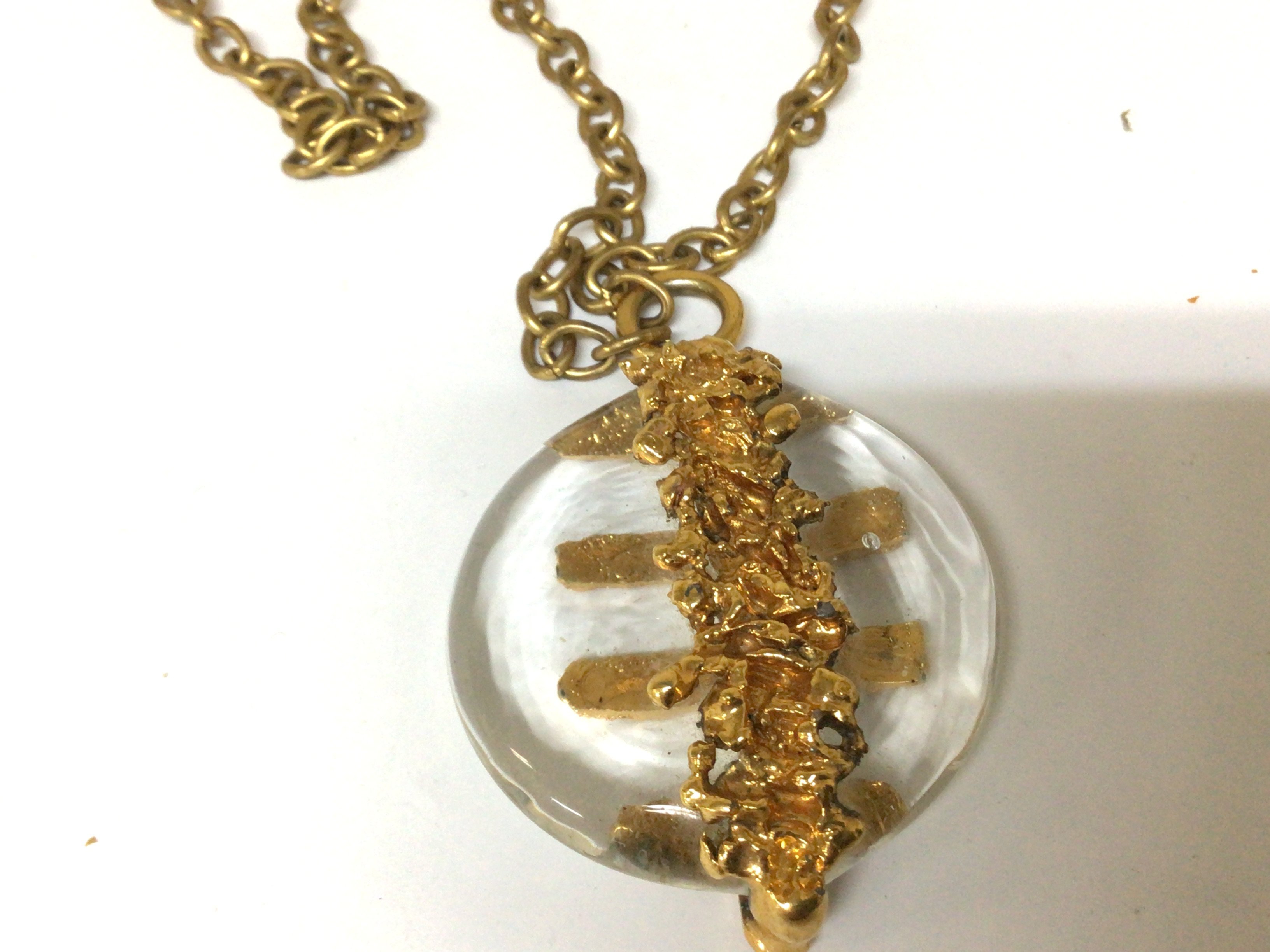 A modern design glass and gold plated necklace by Jacob Hull Denmark.