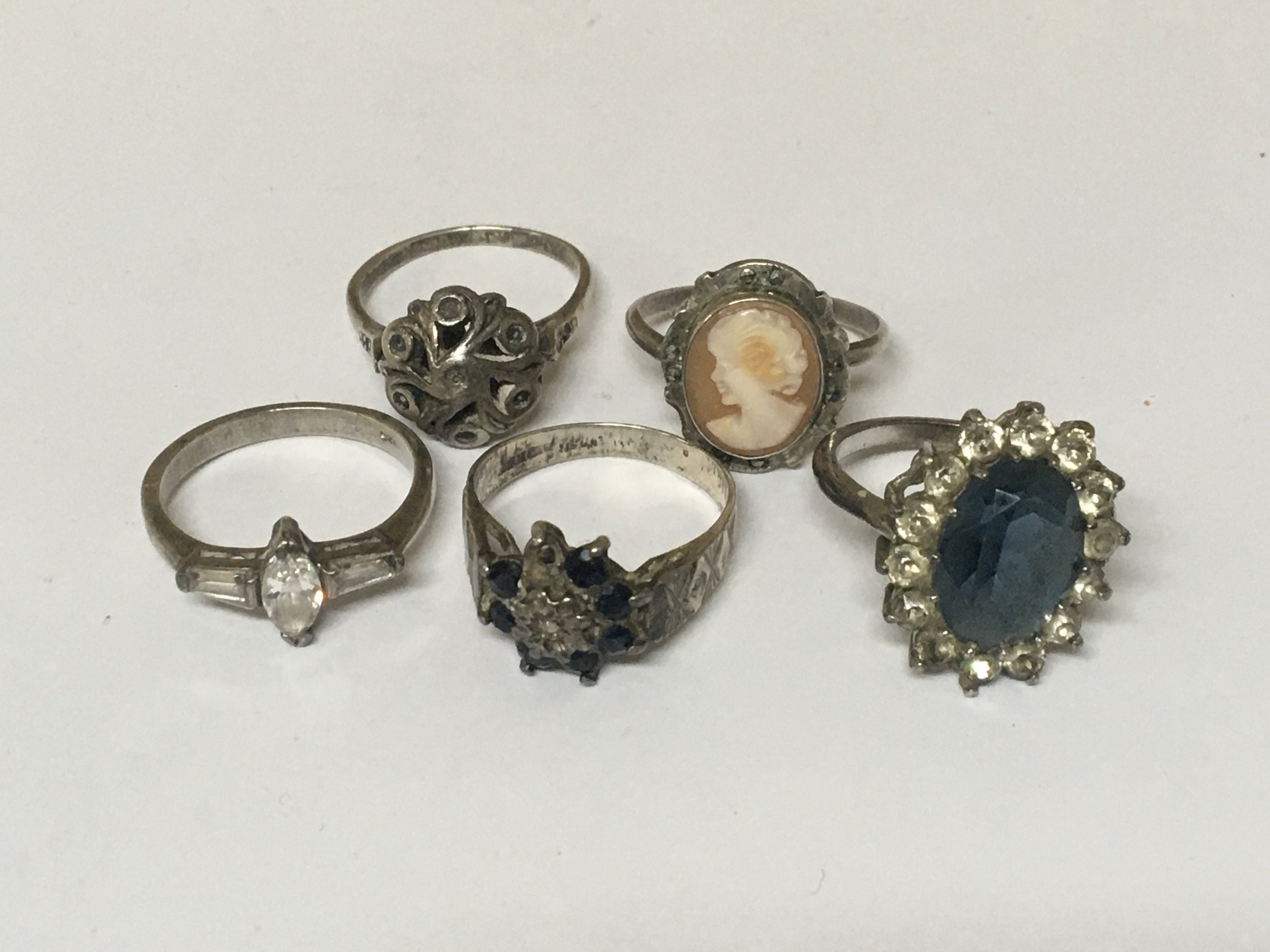 Three gold rings set with amethyst sapphire and other stones weight 9g and five silver rings (9)