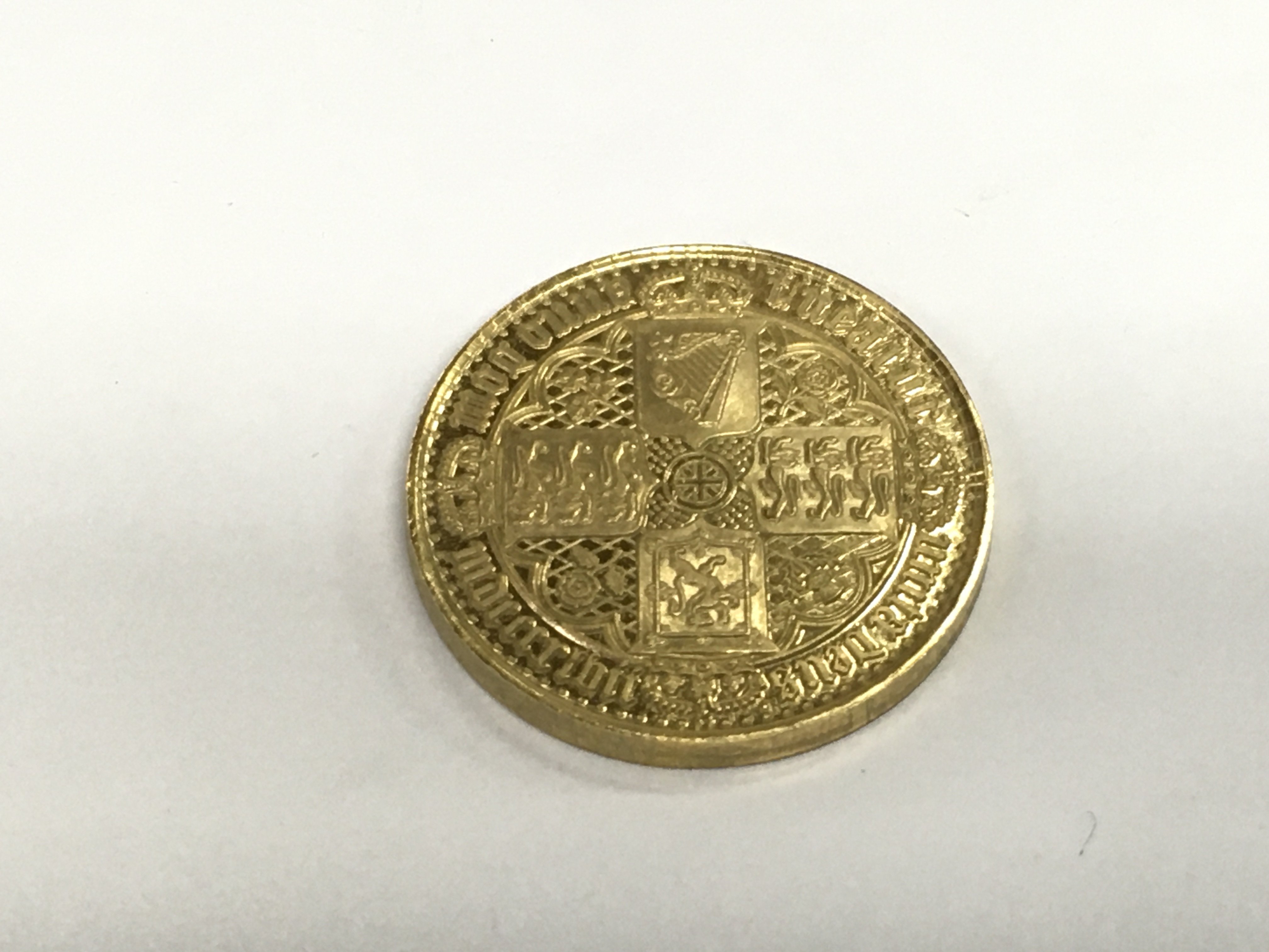 A gold Victorian Gothic sovereign coin, approx 7.2g. Shipping category A.