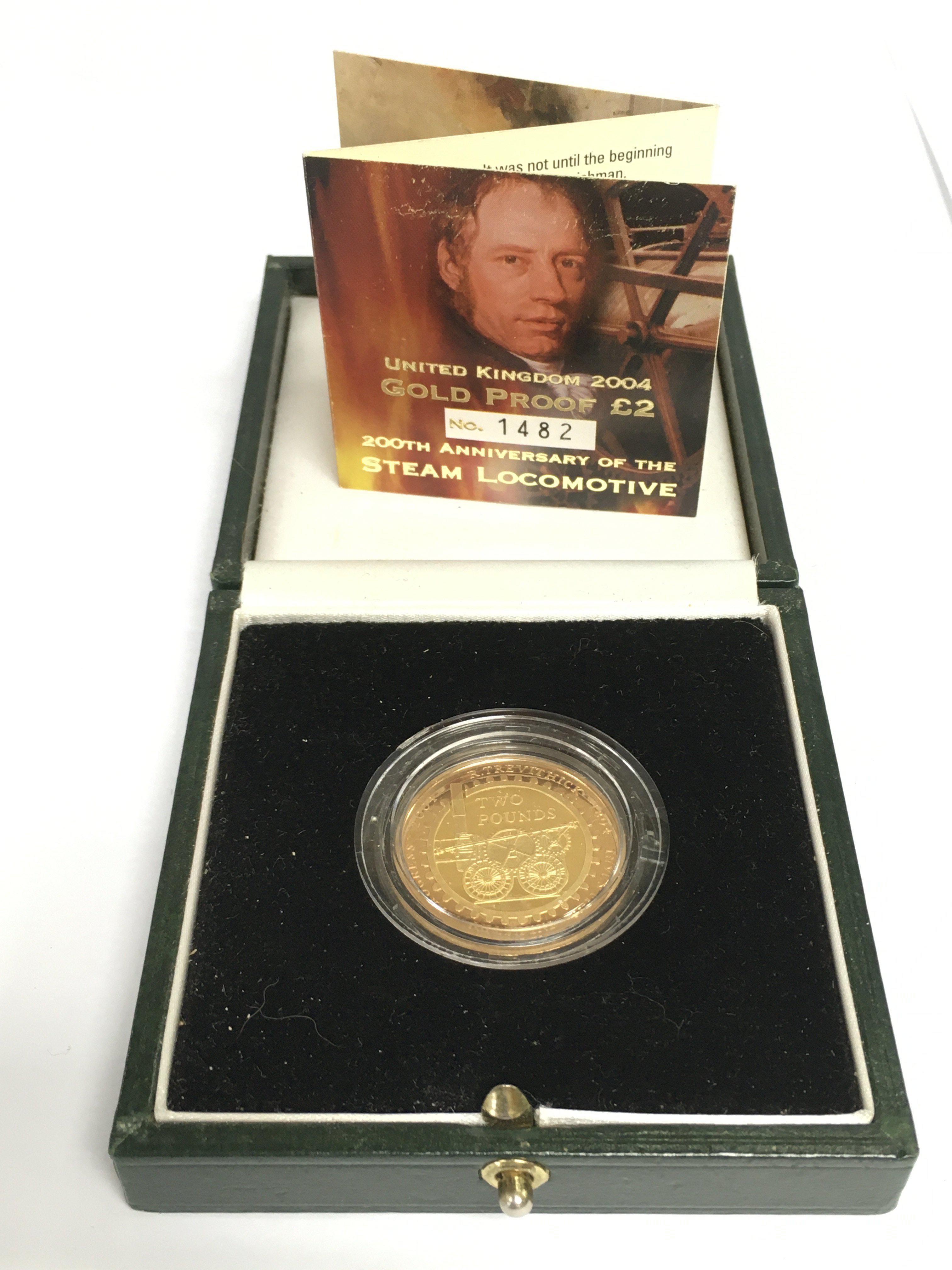 A cased and numbered &#2013266060&#20132660832 proof gold coin commemorating the 200th anniversary of the steam locomotive. Shipping category A.