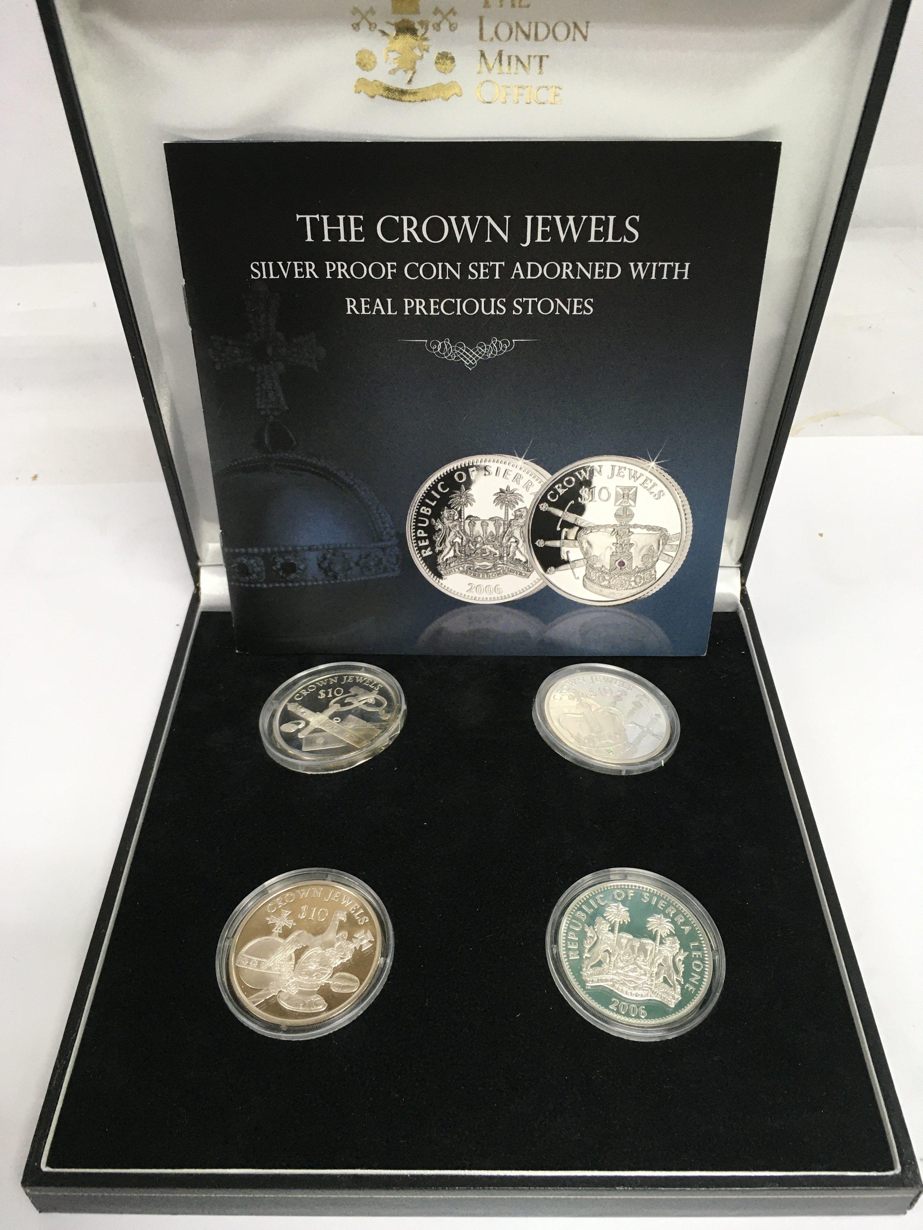 A cased Crown Jewels silver proof coin set. Shipping category B.