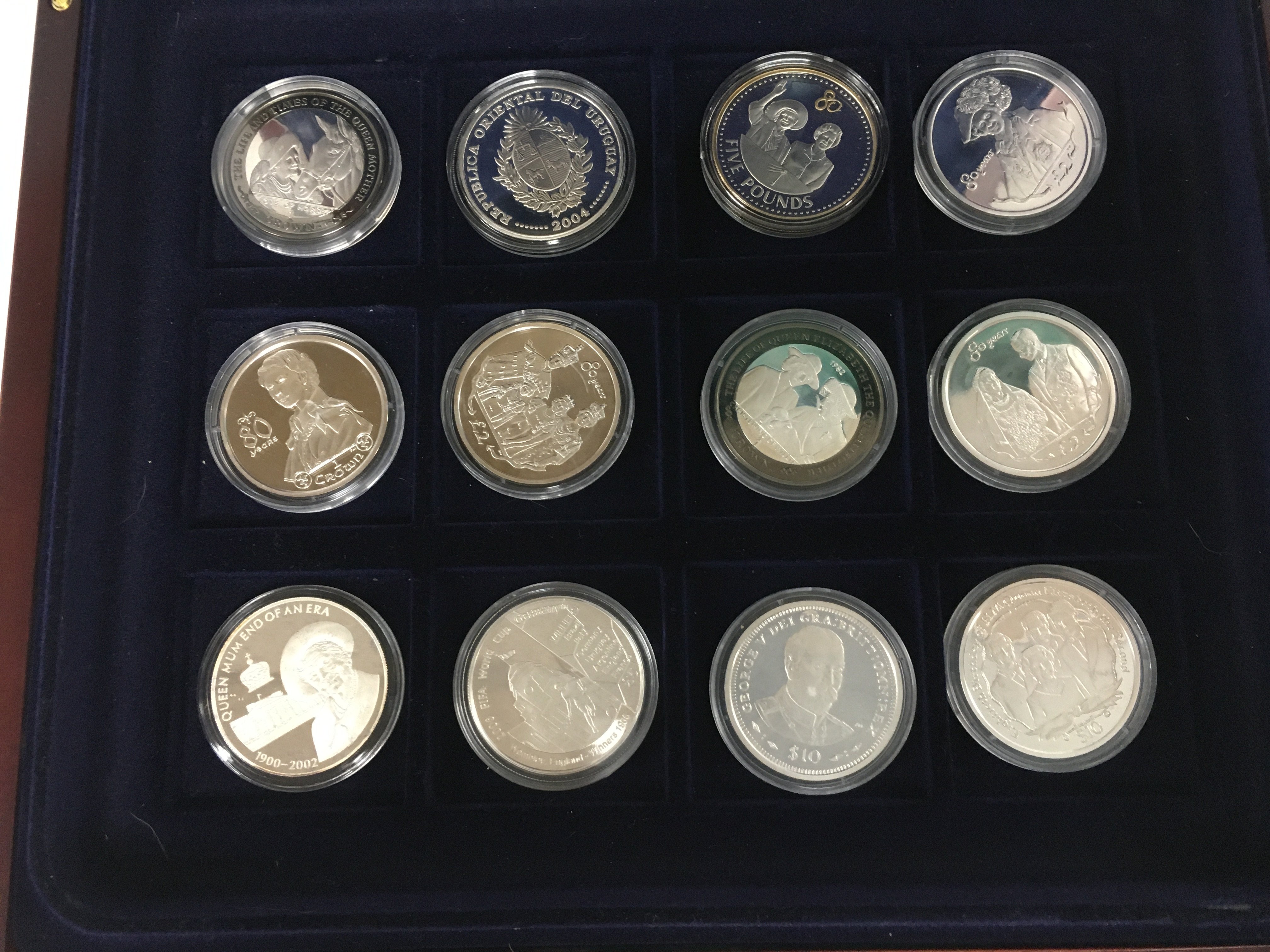 A case containing twelve silver proof coins. Shipping category B.