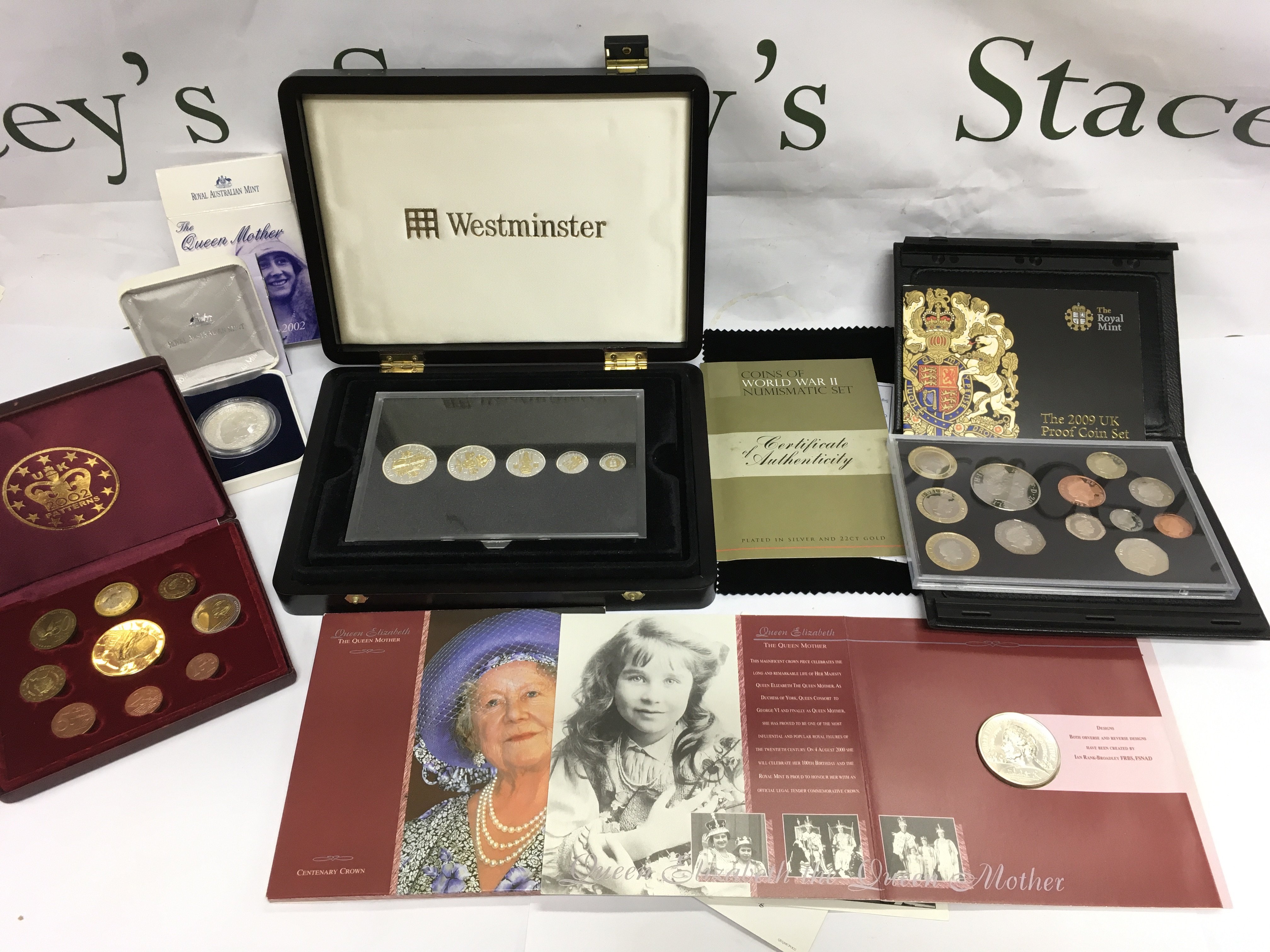 A collection of proof coin sets and covers including a 2002 Patterns set, WW2 coin set etc. Shipping category B.