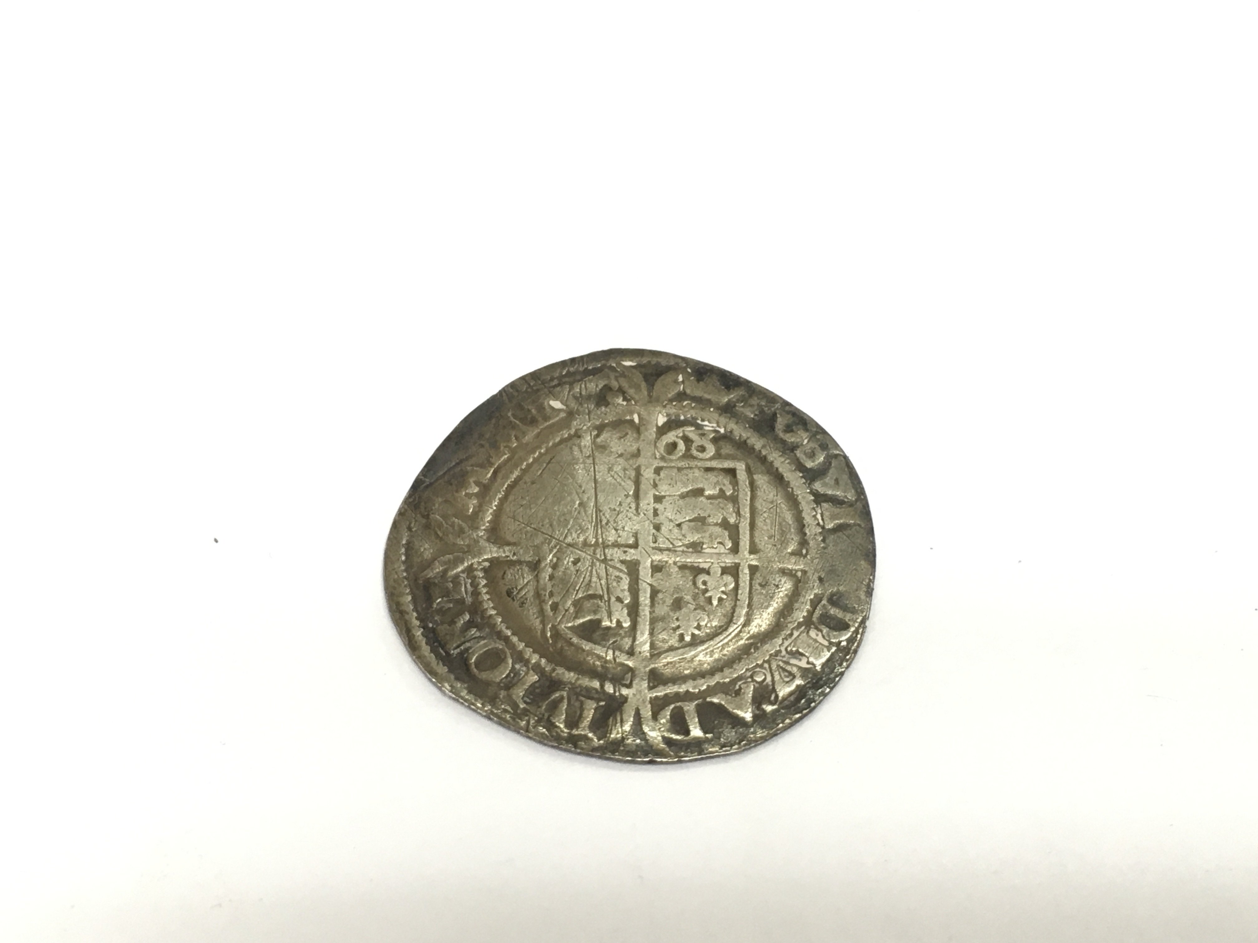 An Elizabeth I shilling, hammered and worn. Shipping category A.